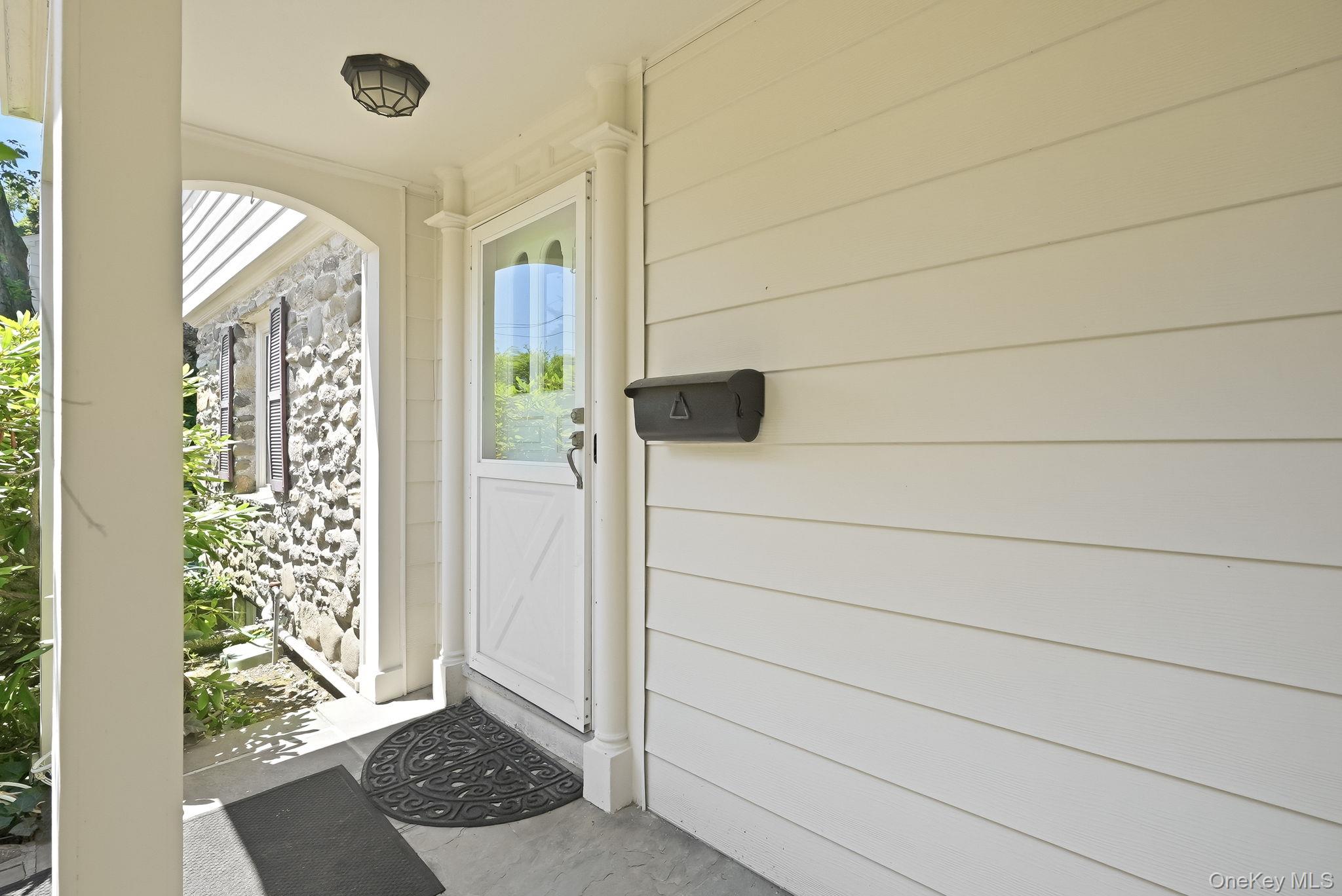 1 Sheridan Road Scarsdale, NY 10583 - Photo 3 of 40 Covered front portico welcomes you and protects you from the elements