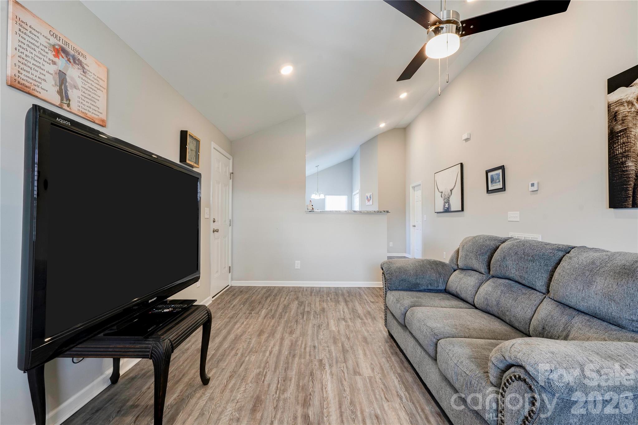 939 Costner Road Shelby, NC 28150 - Photo 3 of 34 a living room with furniture and a flat screen tv