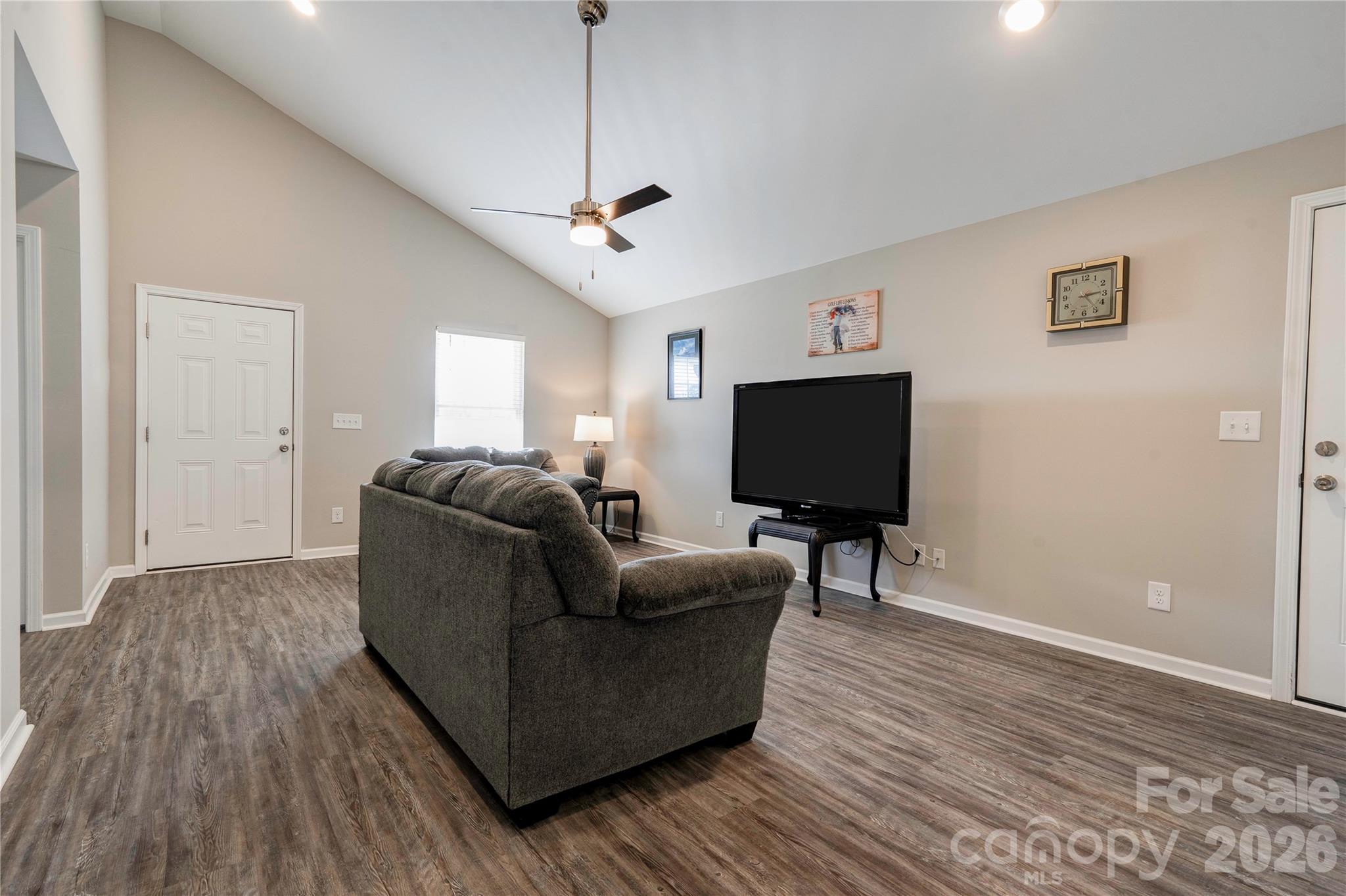 939 Costner Road Shelby, NC 28150 - Photo 4 of 34 a living room with furniture and a flat screen tv