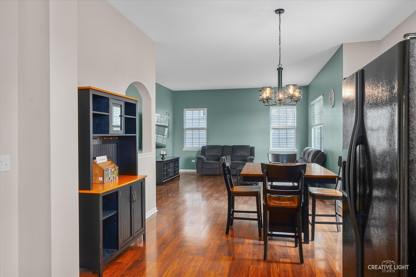 2640 Pecos Circle Montgomery, IL 60538 - Photo 11 of 31 a view of a dining room with furniture and wooden floor