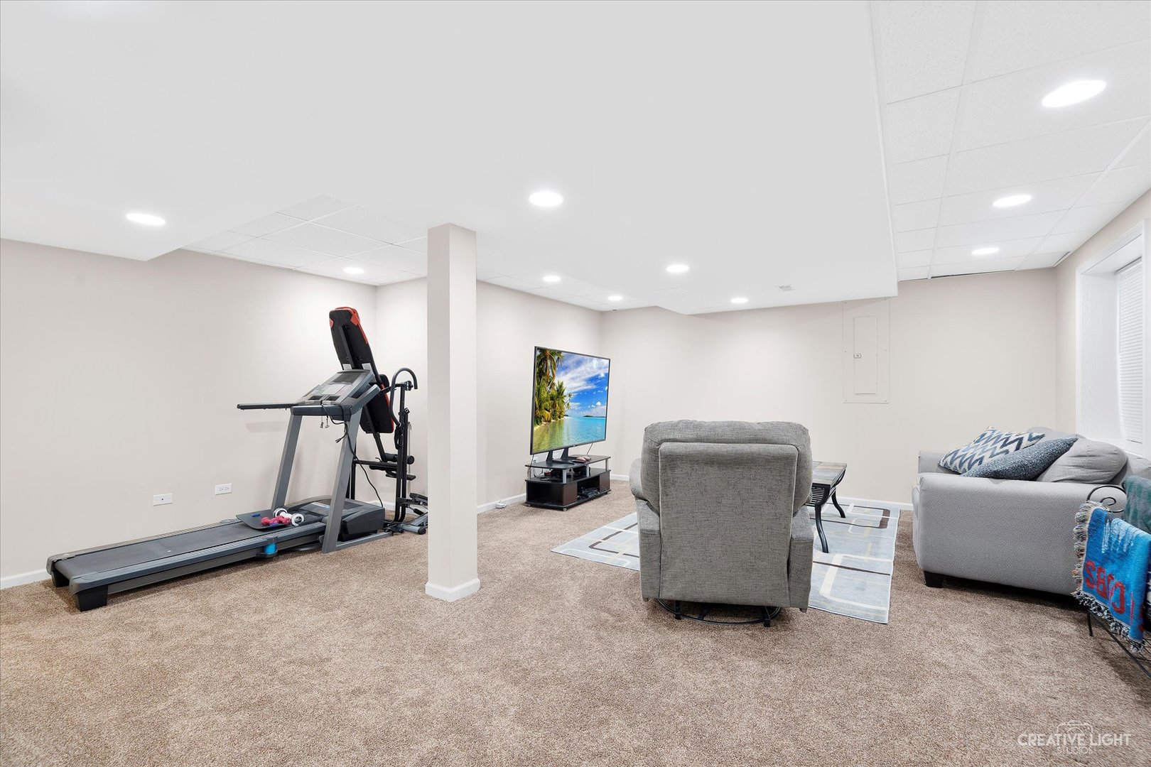 2640 Pecos Circle Montgomery, IL 60538 - Photo 22 of 31 a living room with furniture and a flat screen tv