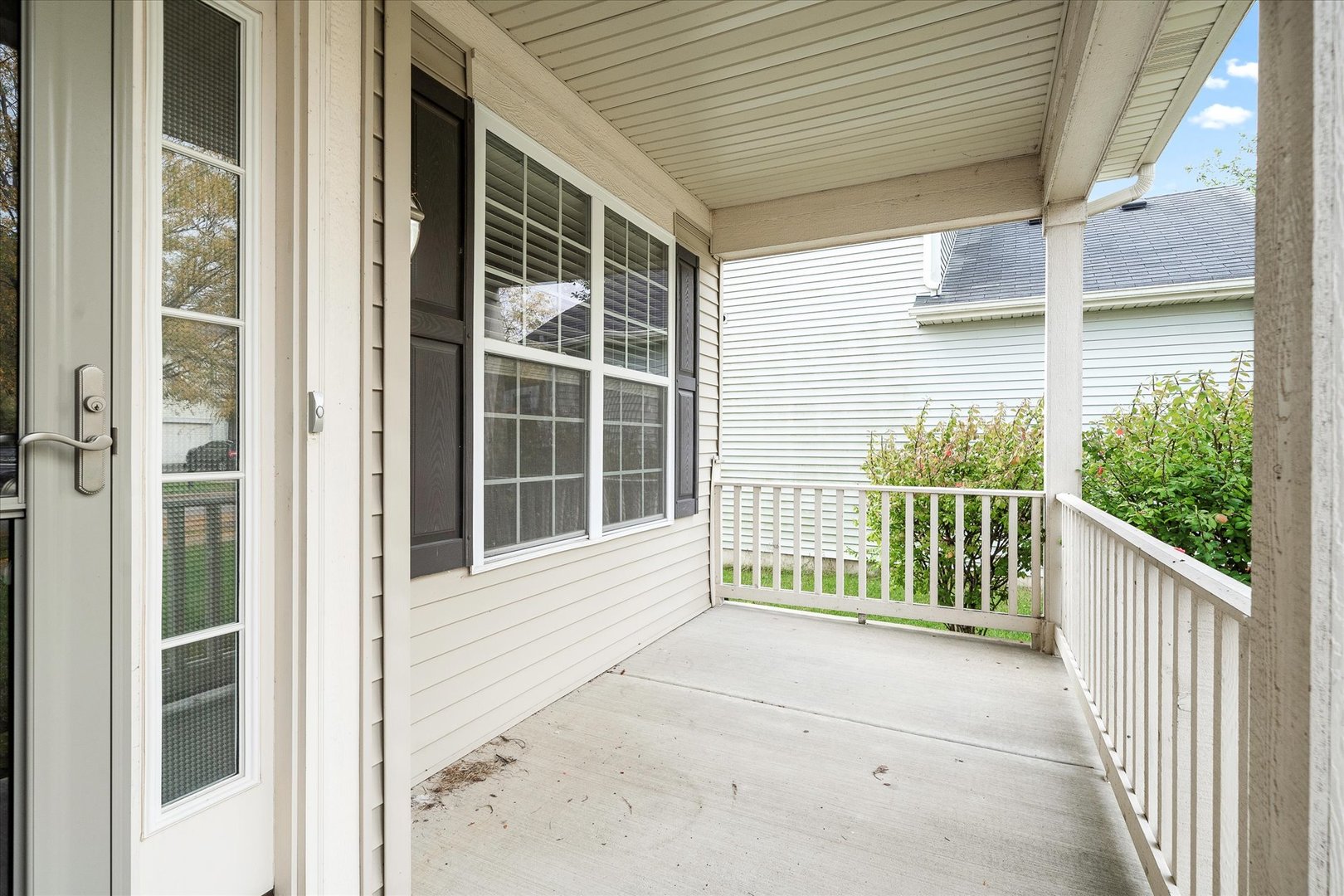 2640 Pecos Circle Montgomery, IL 60538 - Photo 27 of 31 a view of a porch with a floor to ceiling window