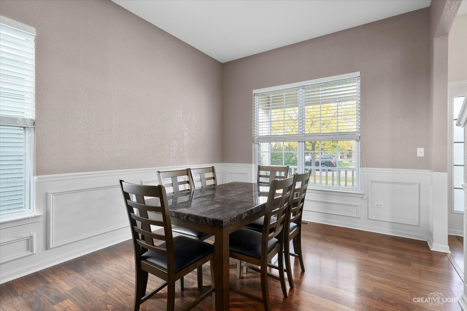 2640 Pecos Circle Montgomery, IL 60538 - Photo 5 of 31 a view of a dining room with furniture and wooden floor