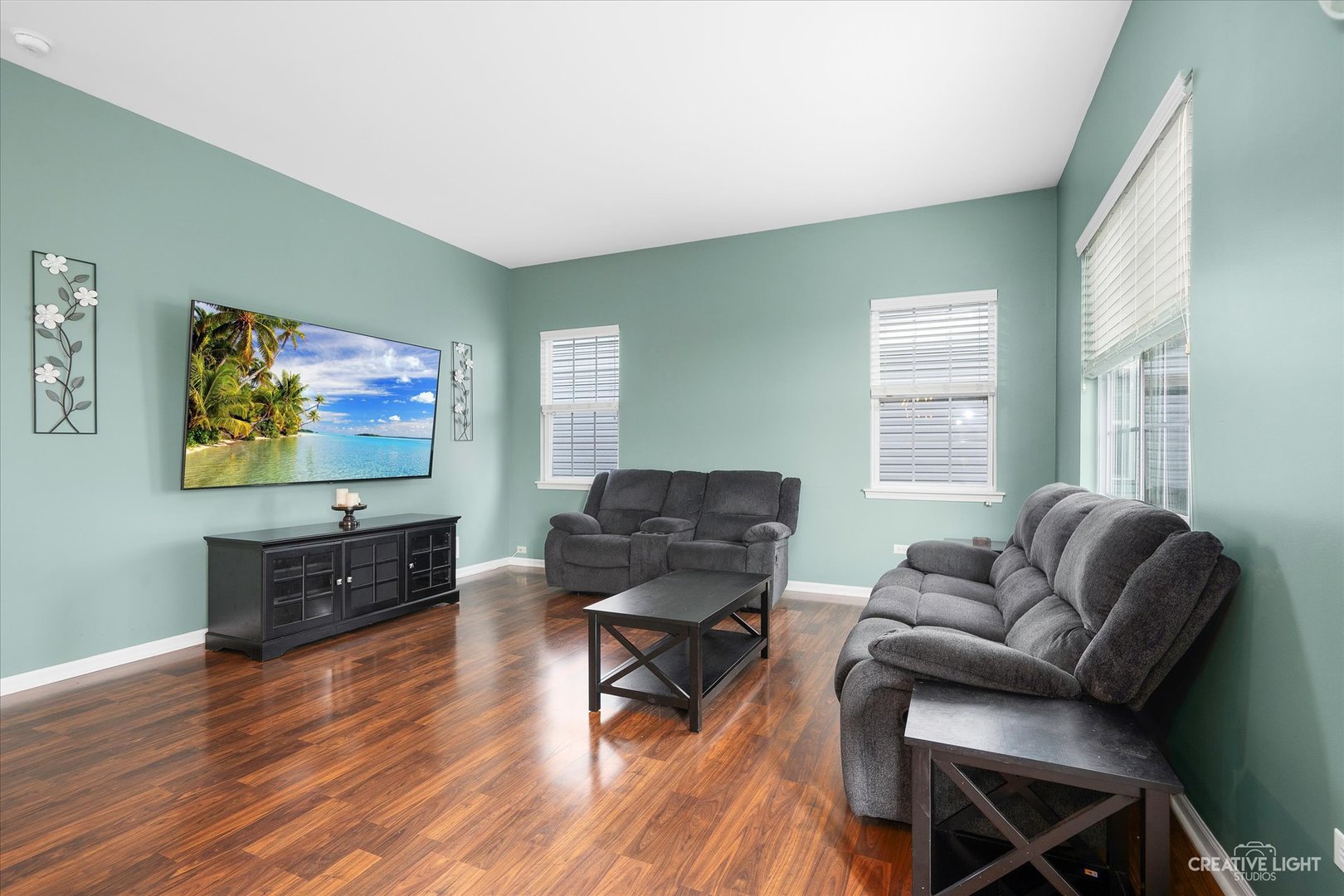 2640 Pecos Circle Montgomery, IL 60538 - Photo 6 of 31 a living room with furniture and a flat screen tv