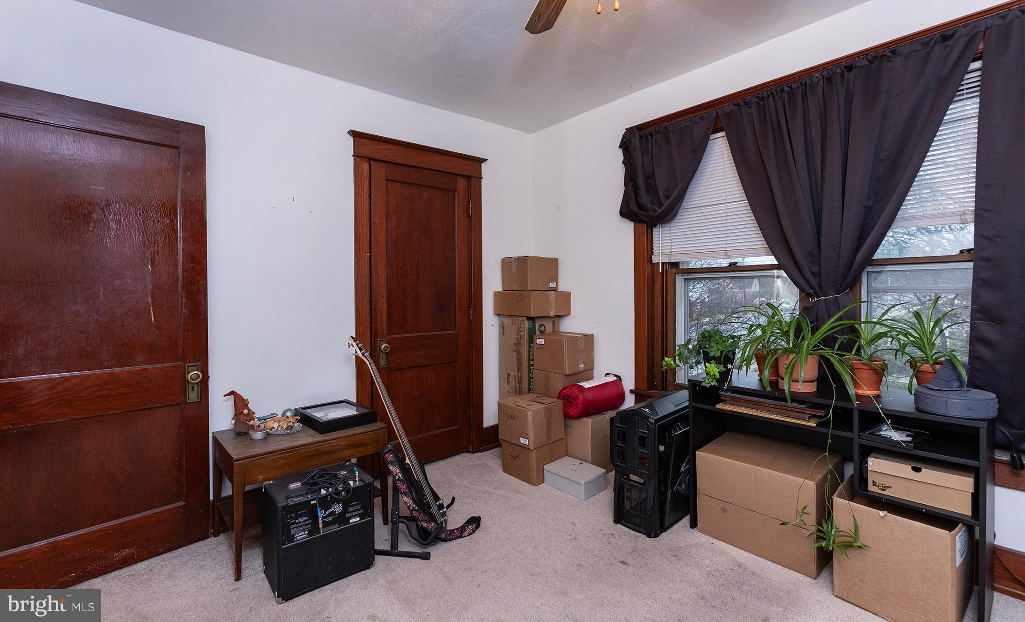 433 East Main Street, Unit B Palmyra, PA 17078 - Photo 23 of 35 a room with gym equipment and a large window