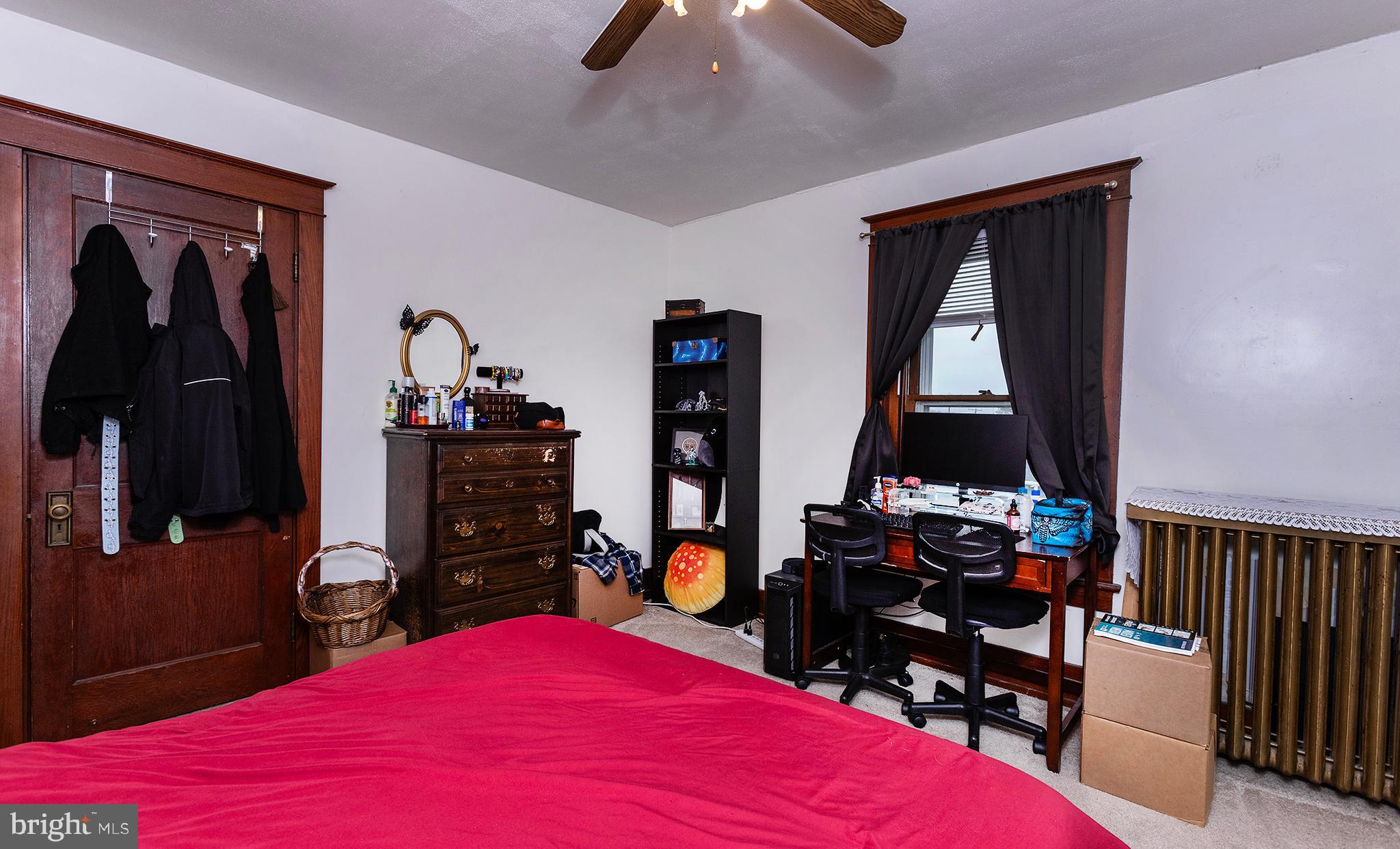 433 East Main Street, Unit B Palmyra, PA 17078 - Photo 25 of 35 a bed room with a bed and a television