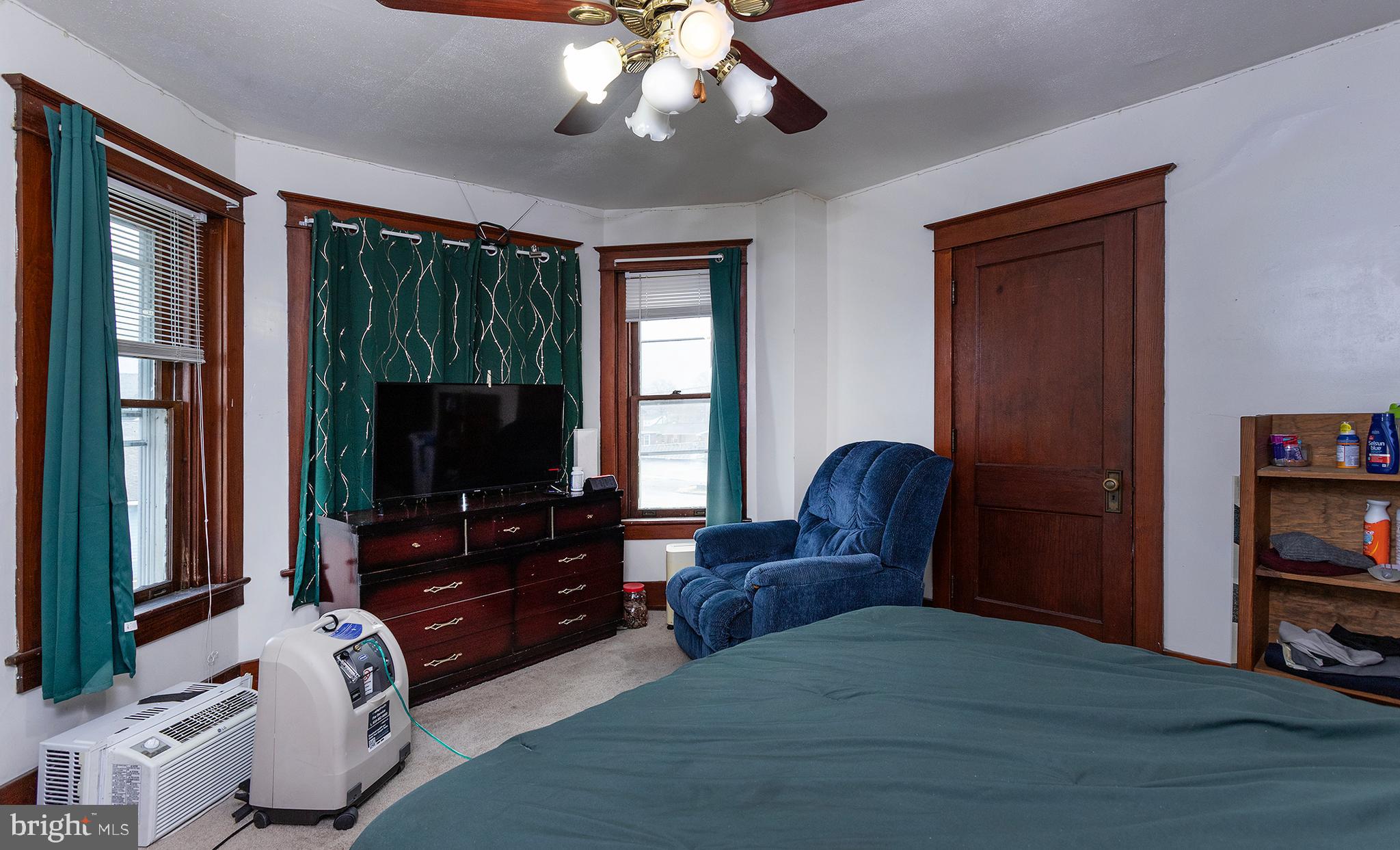 433 East Main Street, Unit B Palmyra, PA 17078 - Photo 29 of 35 a living room with furniture and a flat screen tv