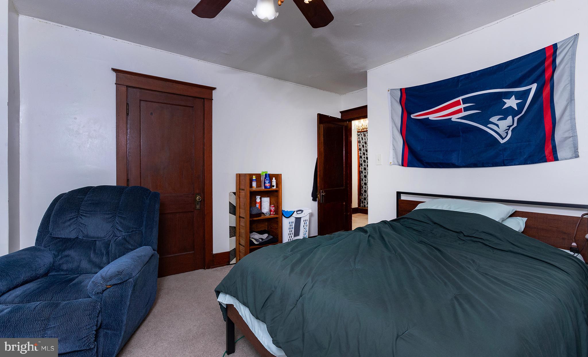 433 East Main Street, Unit B Palmyra, PA 17078 - Photo 30 of 35 a bedroom with a bed and couch