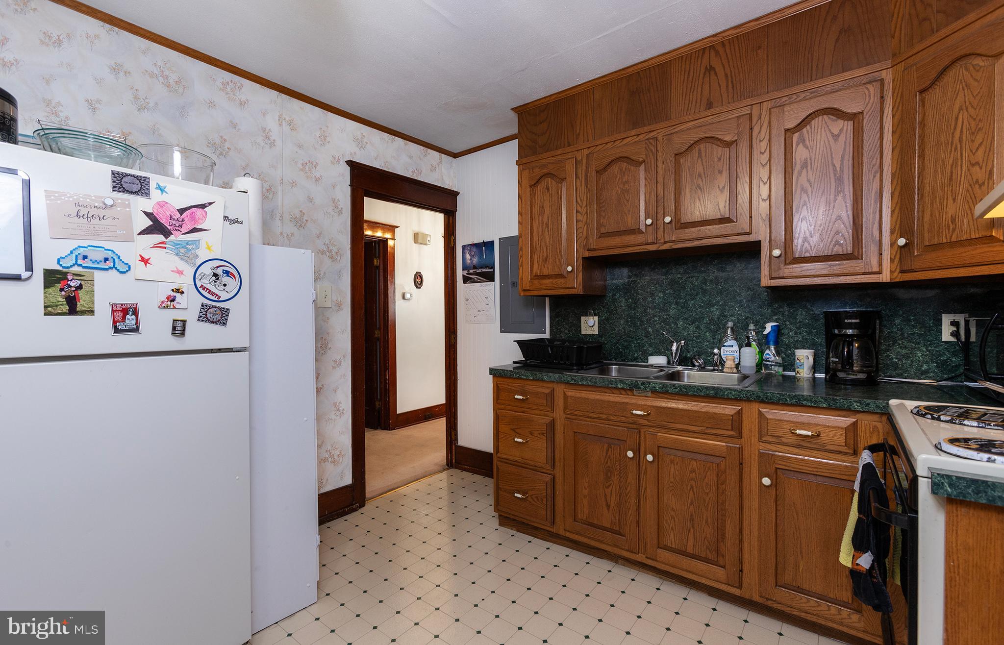 433 East Main Street, Unit B Palmyra, PA 17078 - Photo 10 of 35 a kitchen with stainless steel appliances granite countertop a refrigerator and a stove top oven