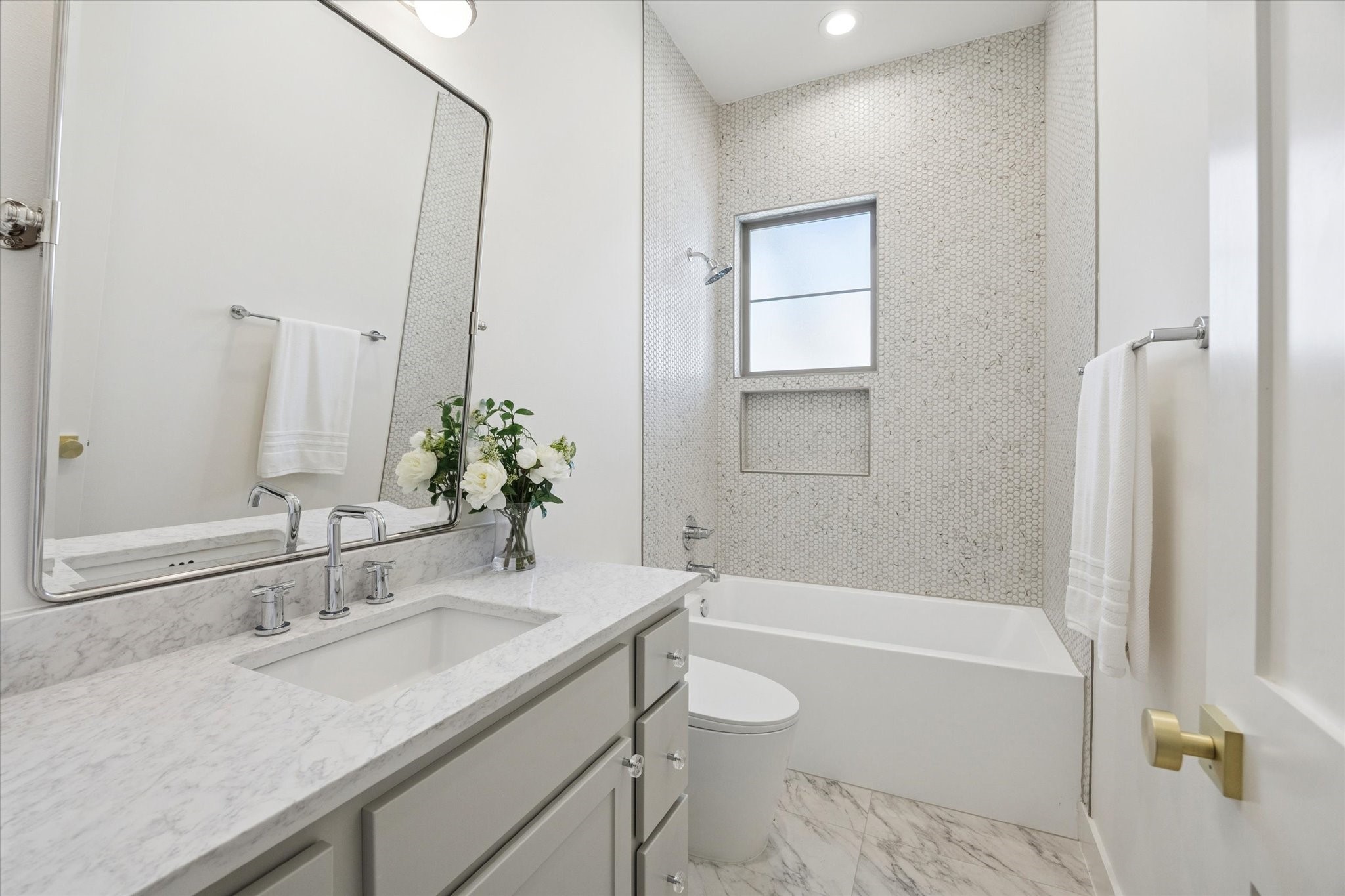 710 East 18th Street Houston, TX 77008 - Photo 26 of 41 a bathroom with a granite countertop sink a toilet and shower