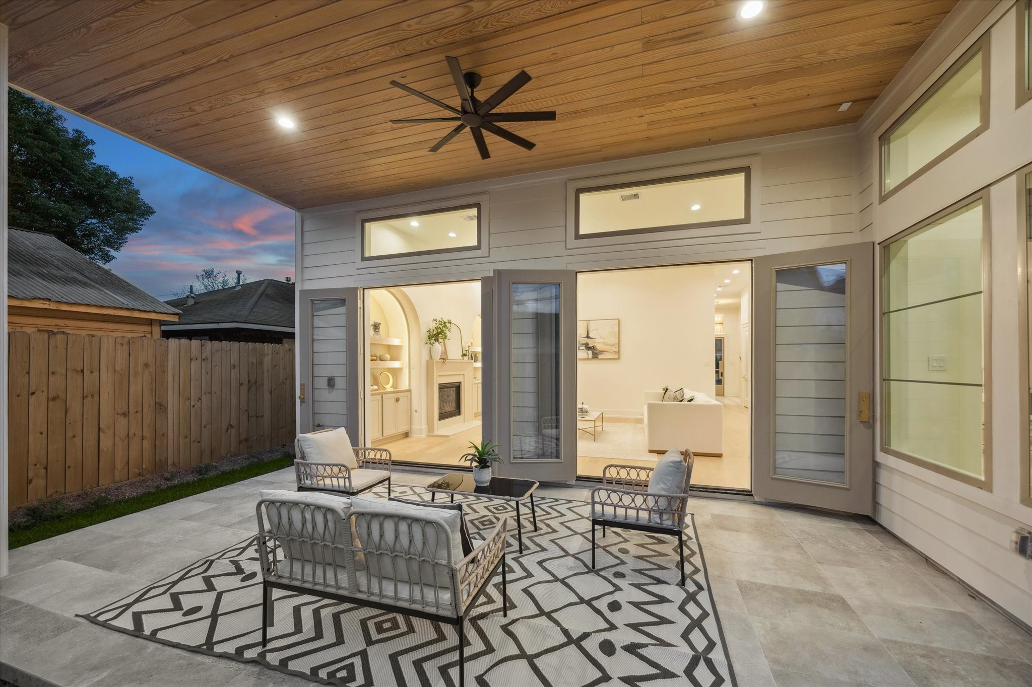 710 East 18th Street Houston, TX 77008 - Photo 33 of 41 Two French doors open to extend your living space outdoors, creating a seamless setting for entertaining.