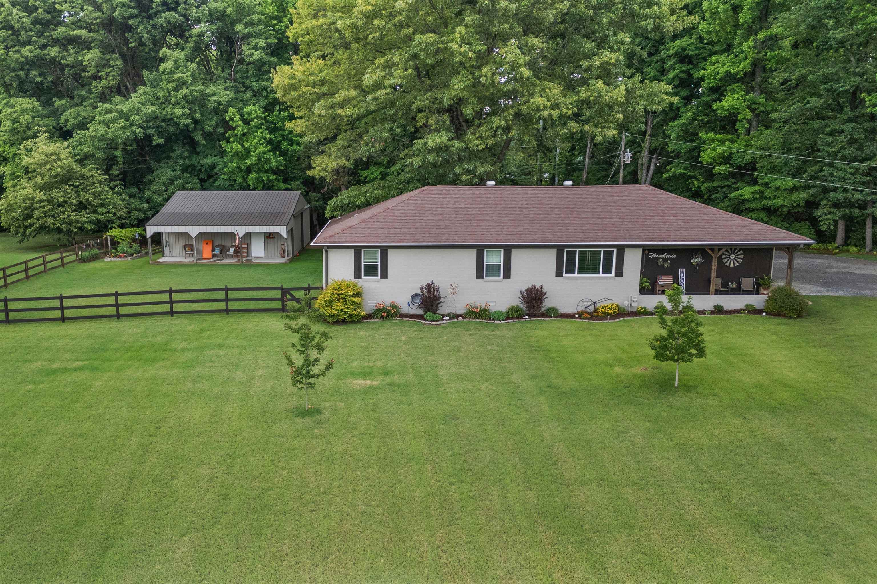 4500 Drummonds Road Drummonds, TN 38023 - Photo 27 of 29 a front view of a house with a yard