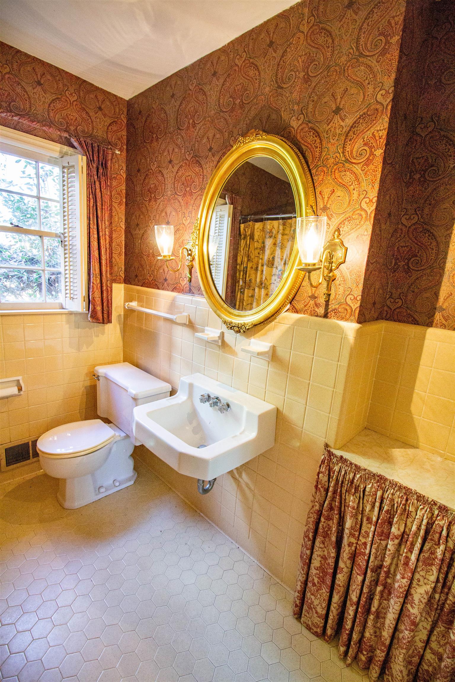283 Church Street Ripley, TN 38063 - Photo 22 of 36 a bathroom with a sink and a mirror