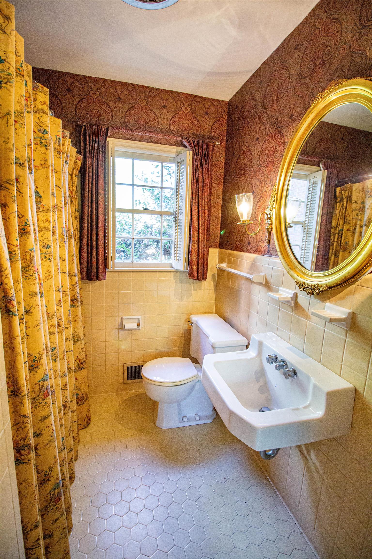 283 Church Street Ripley, TN 38063 - Photo 23 of 36 a bathroom with a sink and a mirror