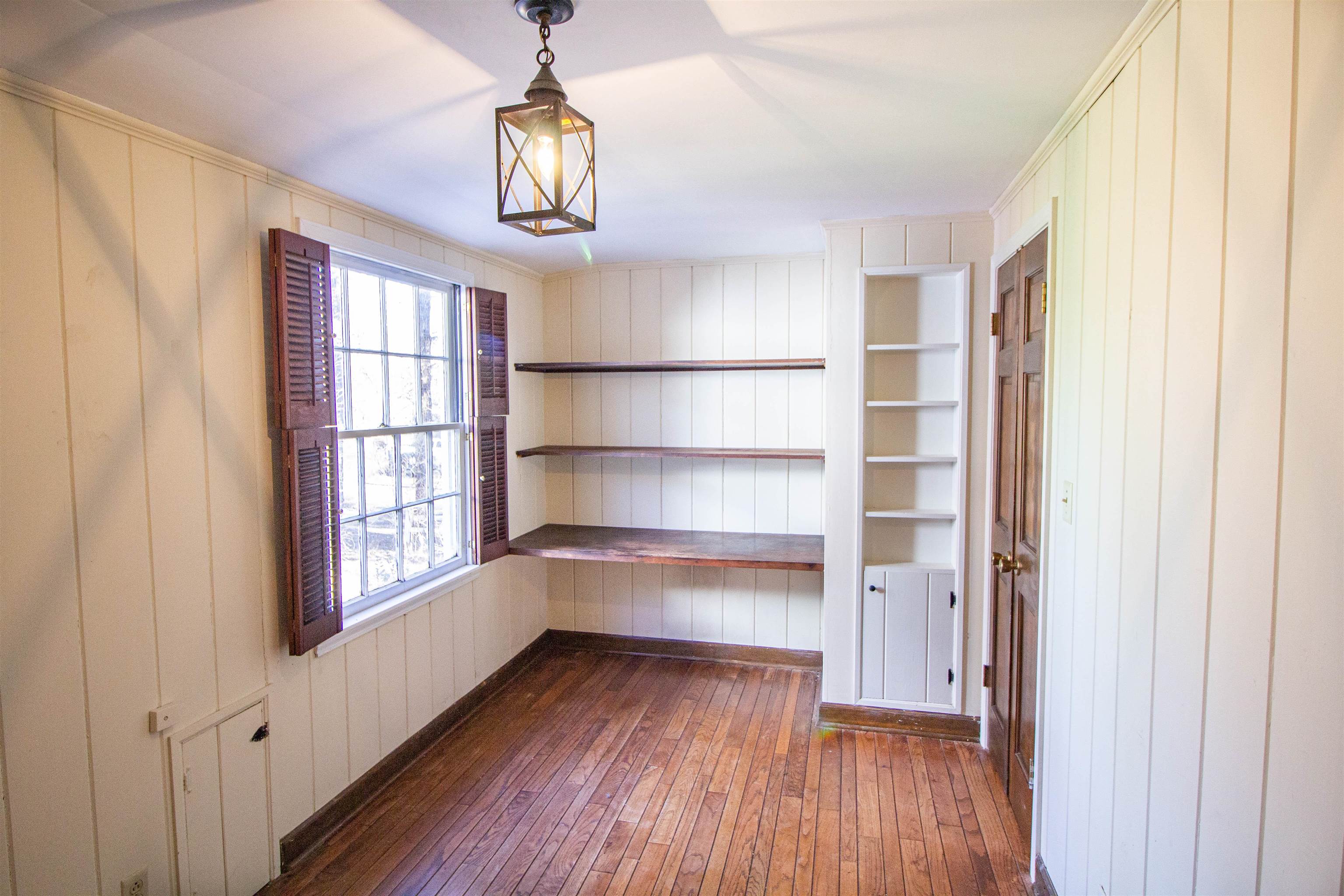 283 Church Street Ripley, TN 38063 - Photo 34 of 36 a view of a room with wooden floor and windows