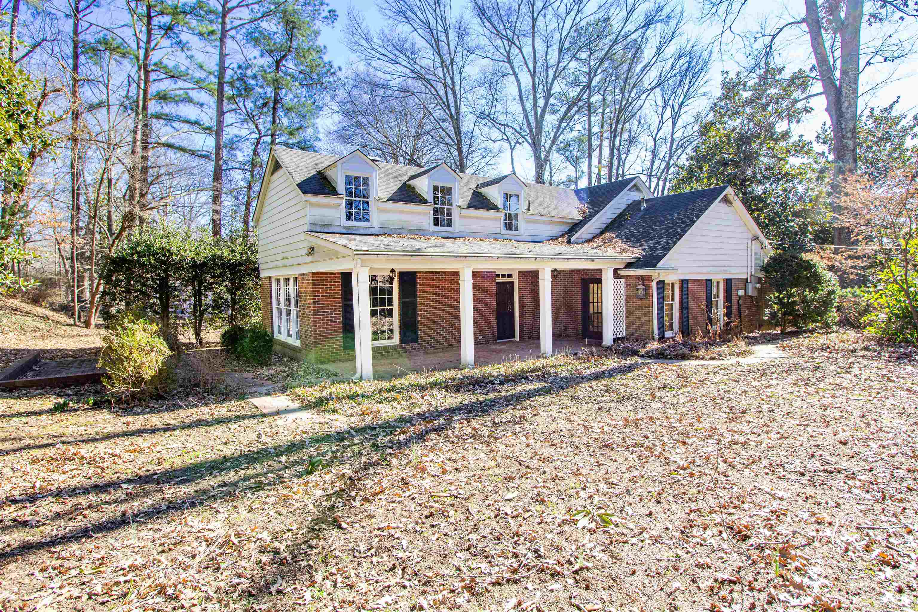 283 Church Street Ripley, TN 38063 - Photo 4 of 36 a front view of a house with a garden