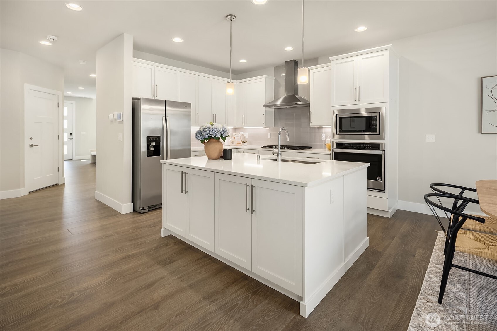 3519 226th Place Southeast Bothell, WA 98021 - Photo 14 of 38 a kitchen with stainless steel appliances a refrigerator a stove a sink and a oven