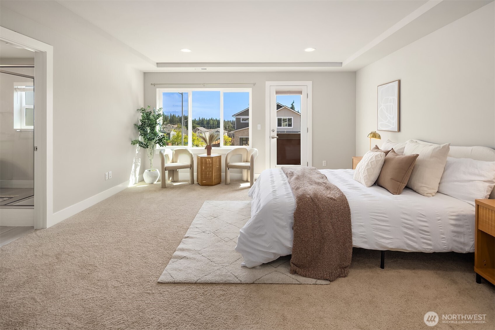 3519 226th Place Southeast Bothell, WA 98021 - Photo 25 of 38 a bedroom with a large bed and a couch
