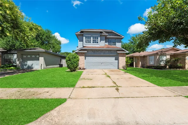 a front view of house with yard