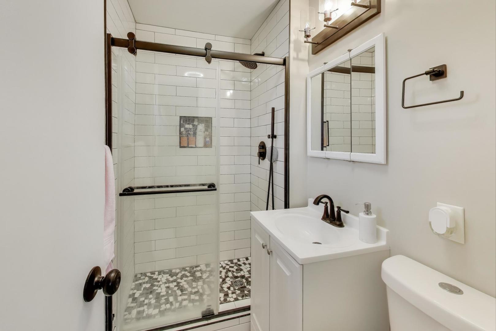 540 Newark Lane Hoffman Estates, IL 60169 - Photo 11 of 23 a bathroom with a shower toilet and sink