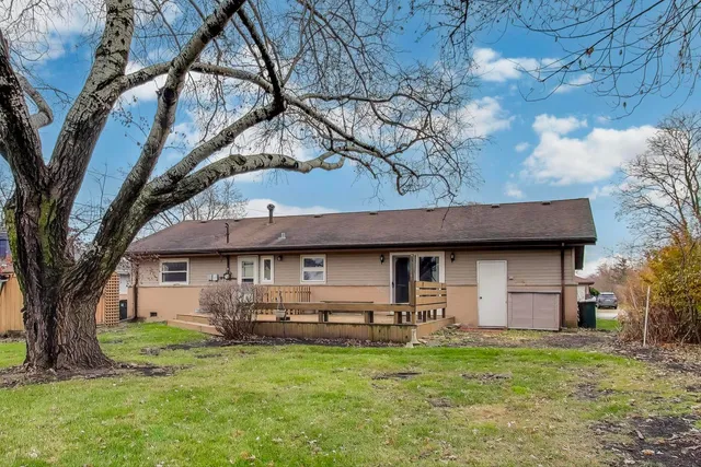 a front view of house with yard