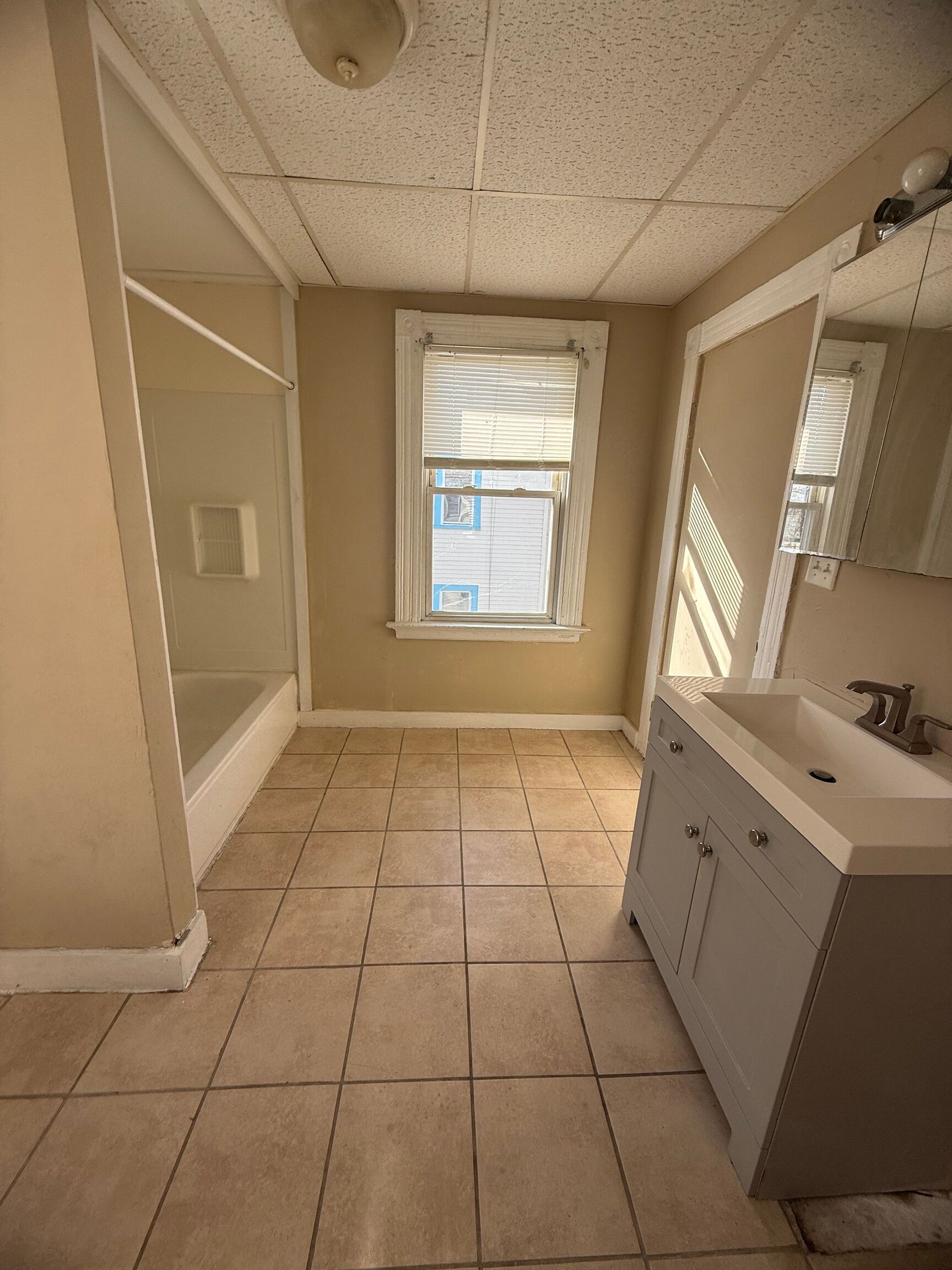 151 Fitch Street New Haven, CT 06515 - Photo 12 of 15 a view of an empty room with a window