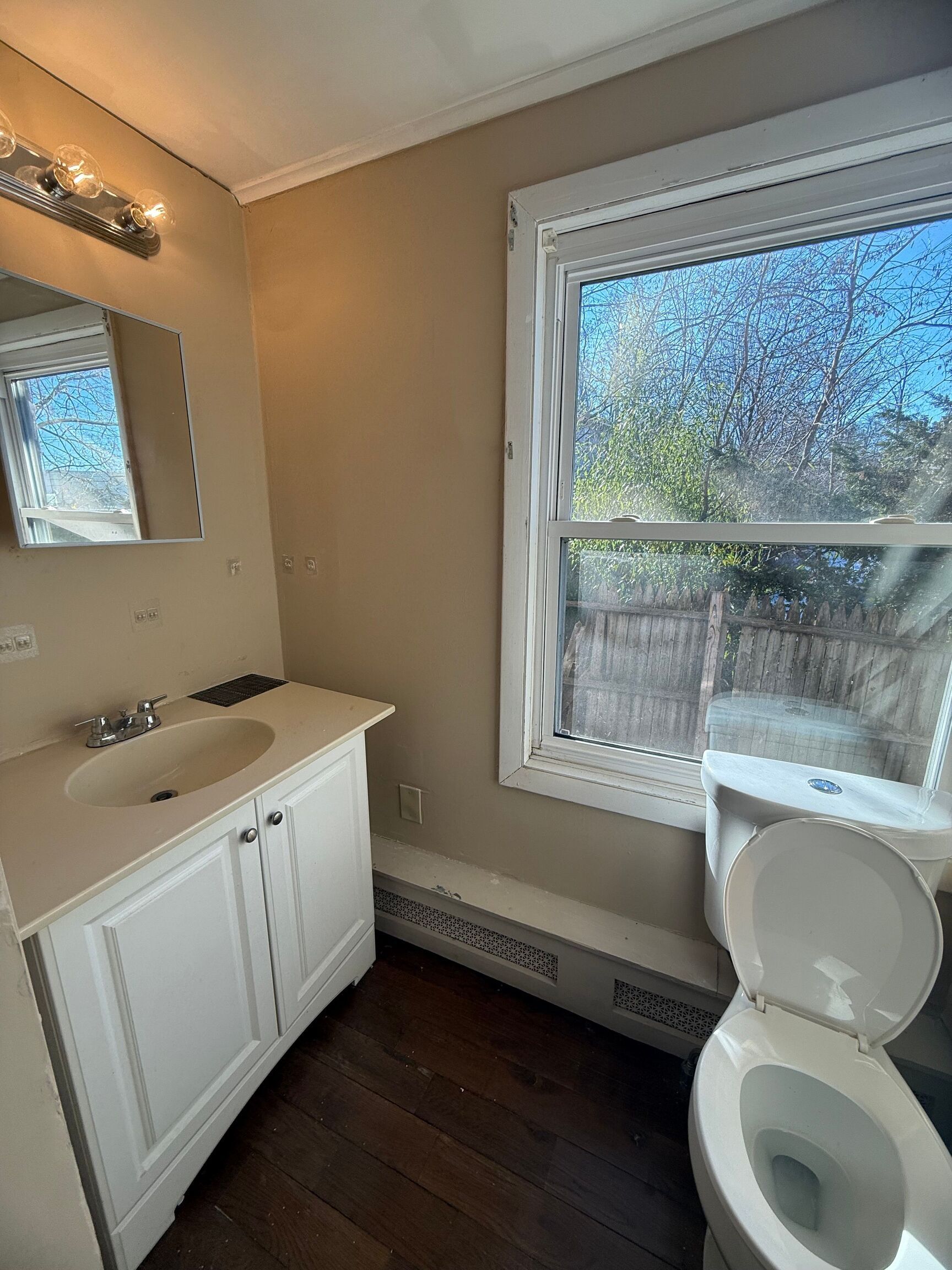 151 Fitch Street New Haven, CT 06515 - Photo 14 of 15 a bathroom with a toilet sink and mirror