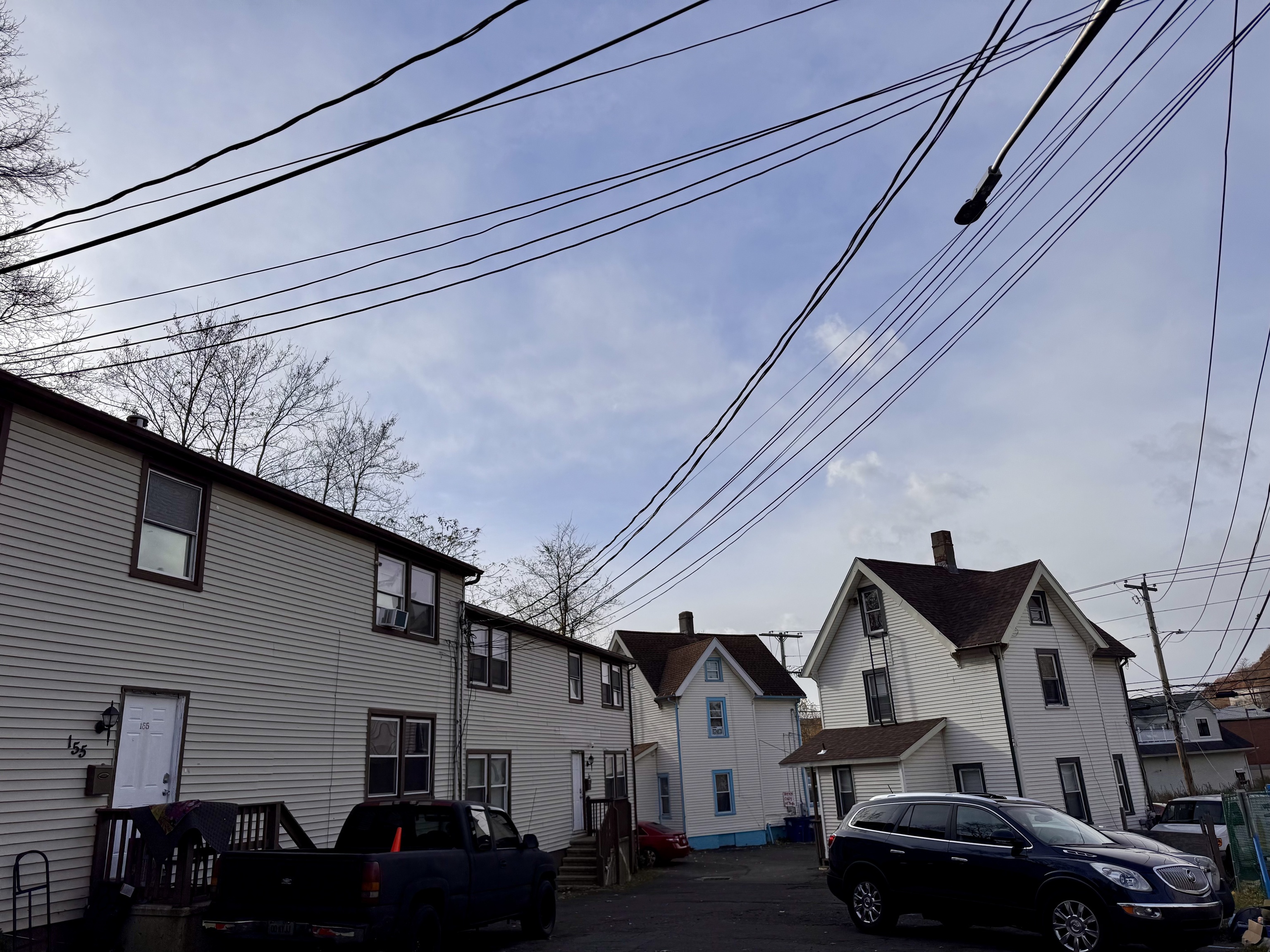 151 Fitch Street New Haven, CT 06515 - Photo 2 of 15 a front view of a house with cars parked