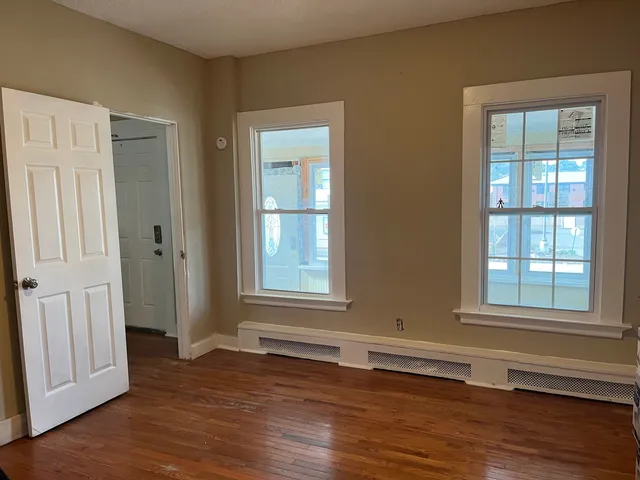 a kitchen with a stove and a refrigerator