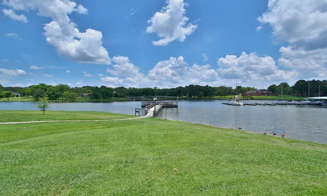 a garden view with a lake view