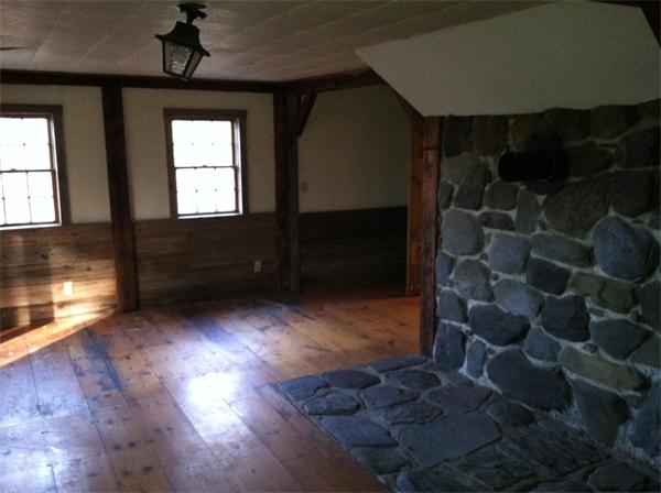 34 Garrison Road Shirley, MA 01464 - Photo 10 of 10 a living room with a black gate