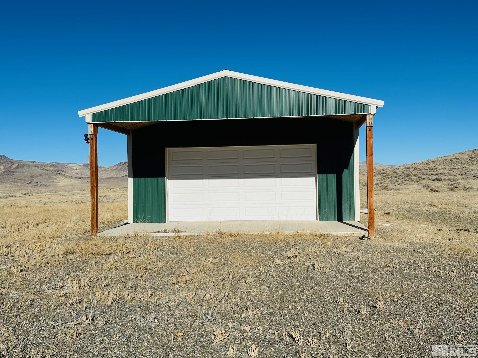 T26 Sec 1 Lovelock, NV 89419 - Photo 5 of 15 a front view of a house with a yard