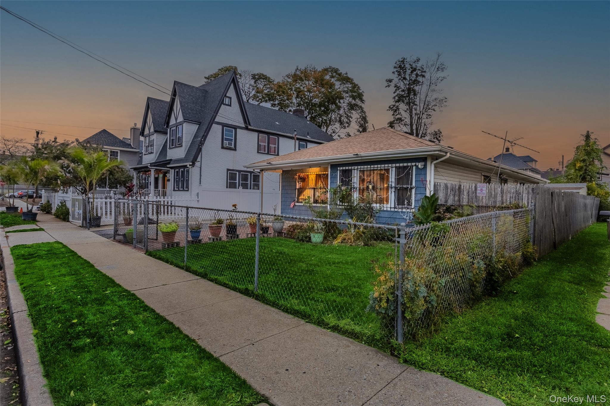 79 Union Place Hempstead, NY 11550 - Photo 23 of 24 a front view of a house with yard and green space