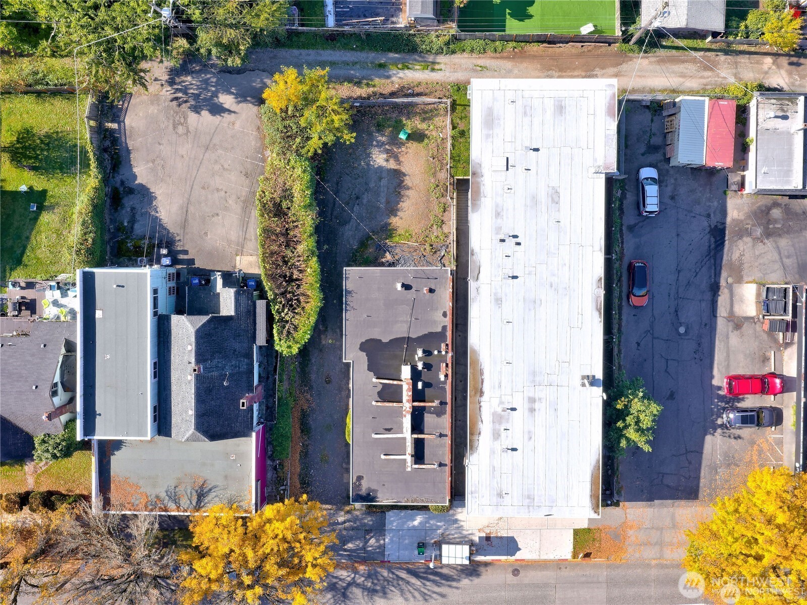 6517 35th Avenue Southwest Seattle, WA 98126 - Photo 11 of 11 an aerial view of residential houses with outdoor space