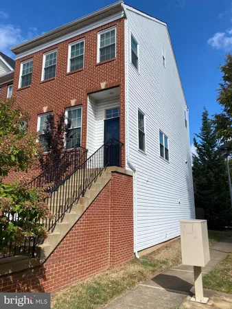 a front view of a house with balcony
