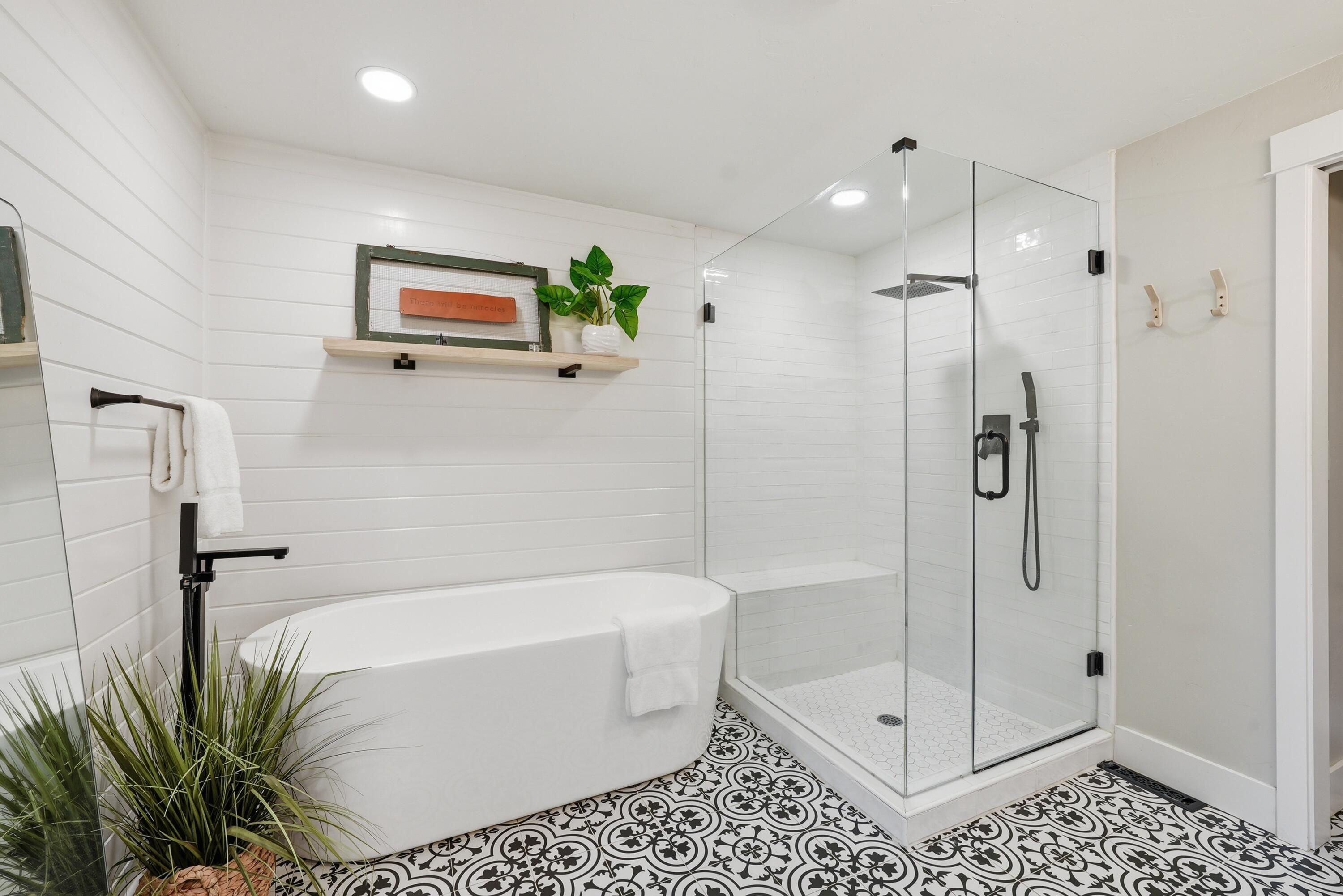1961 Southwest Knoll Avenue Bend, OR 97702 - Photo 16 of 53 a bathroom with a bathtub and a shower