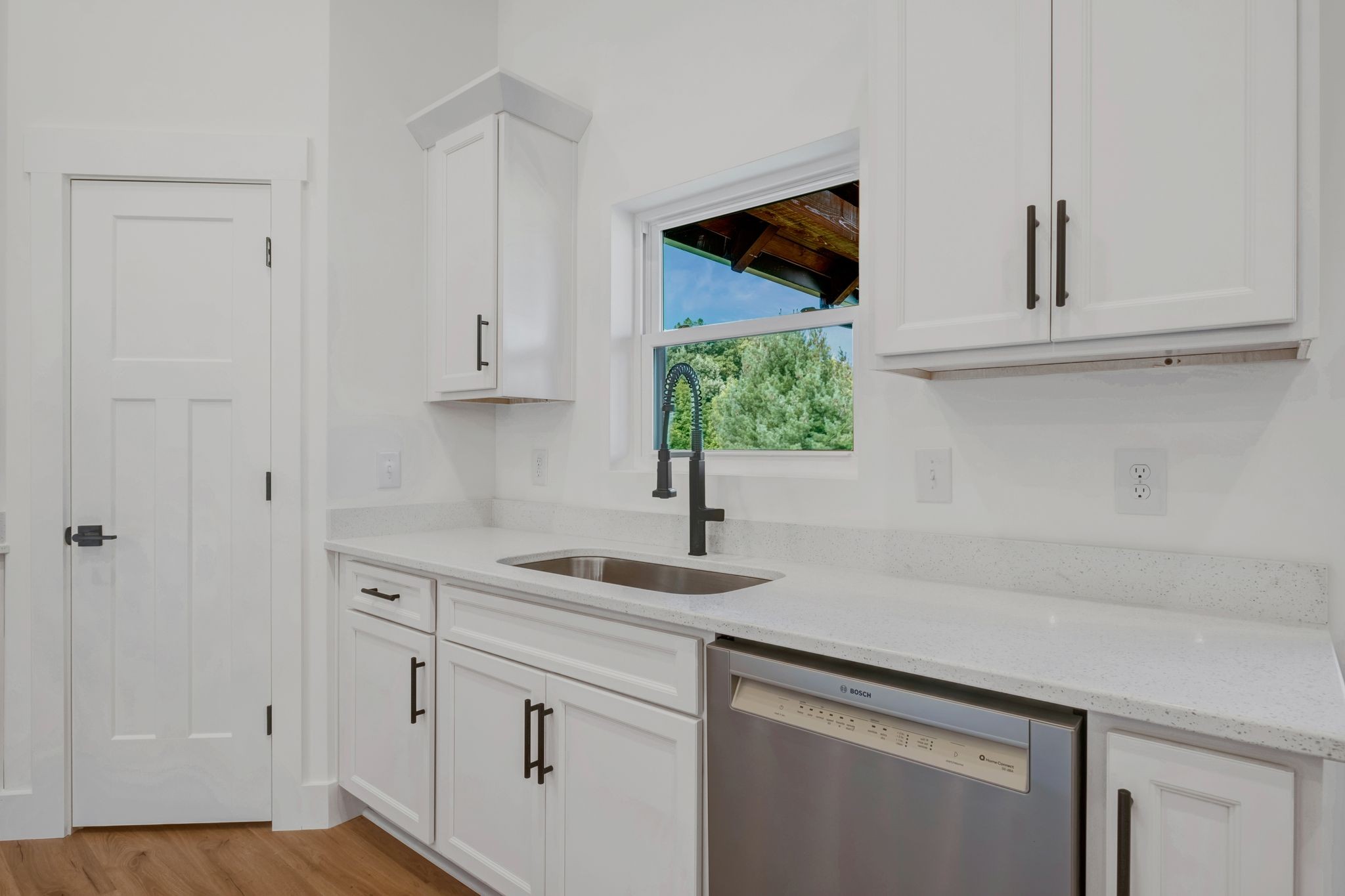 5050 Richards Road Adams, TN 37010 - Photo 14 of 52 a kitchen with stainless steel appliances white cabinets and a sink
