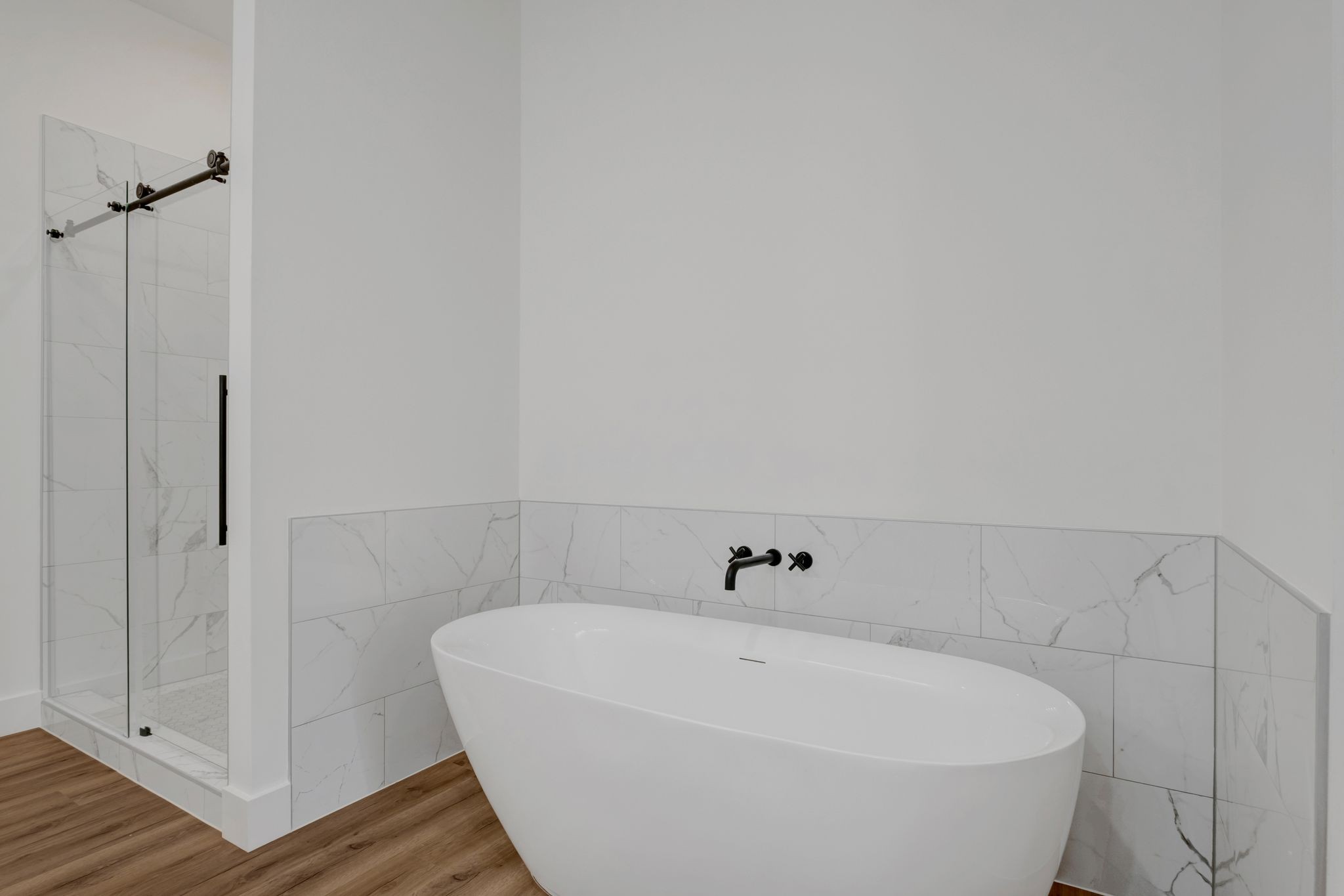 5050 Richards Road Adams, TN 37010 - Photo 21 of 52 a white bath tub sitting in a bathroom