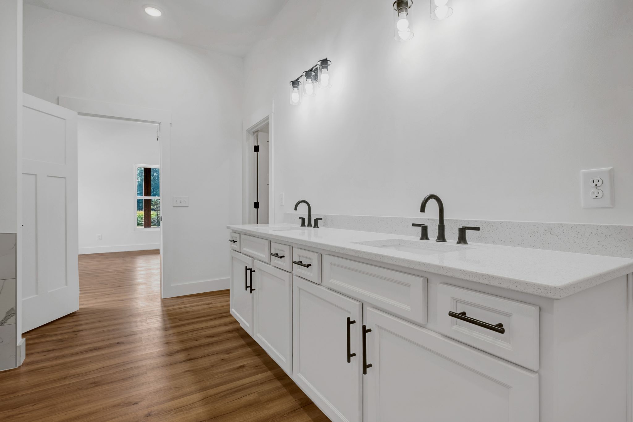 5050 Richards Road Adams, TN 37010 - Photo 23 of 52 a spacious bathroom with double vanity and a mirror