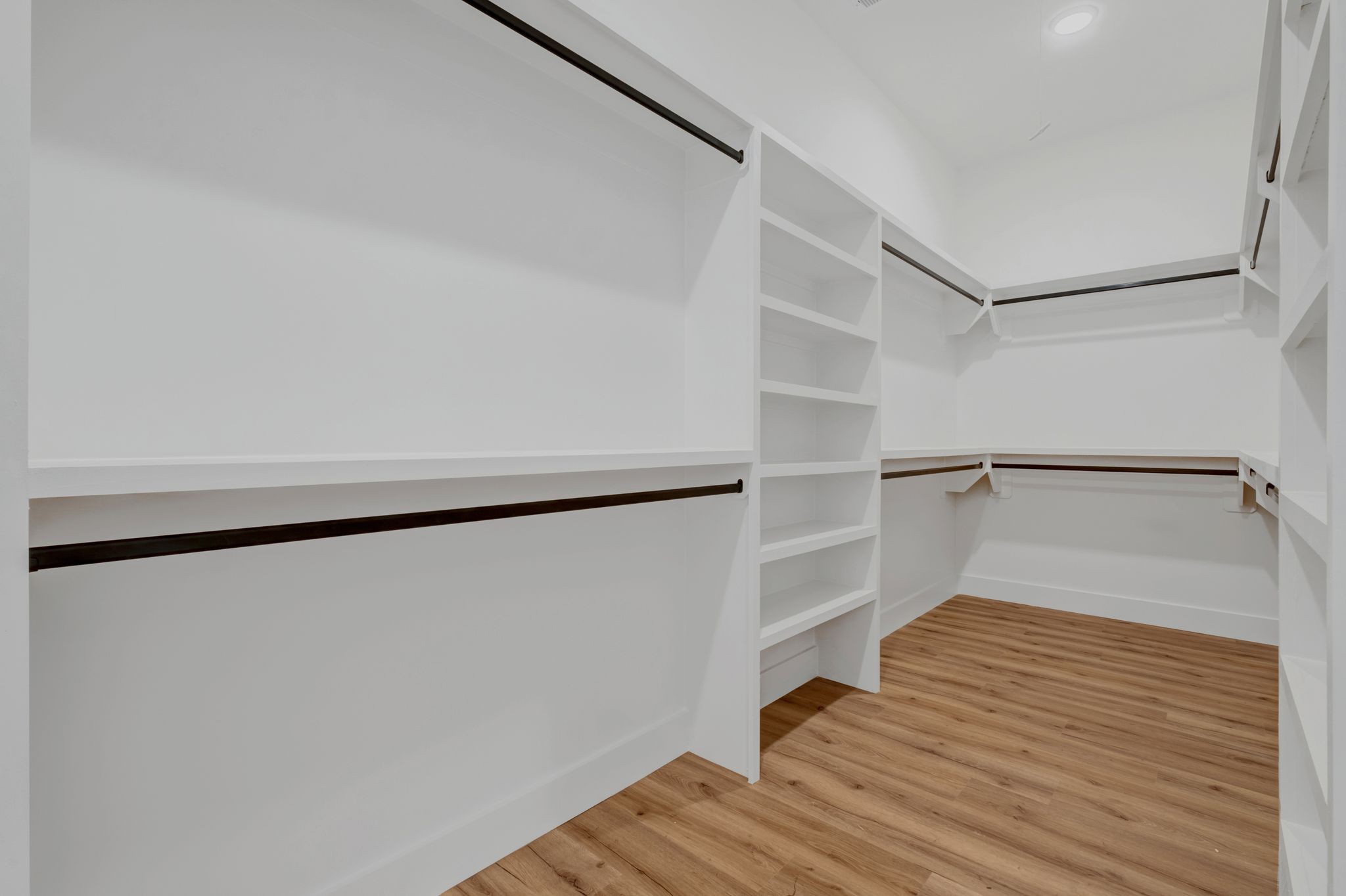 5050 Richards Road Adams, TN 37010 - Photo 24 of 52 a view of walk in closet with empty racks