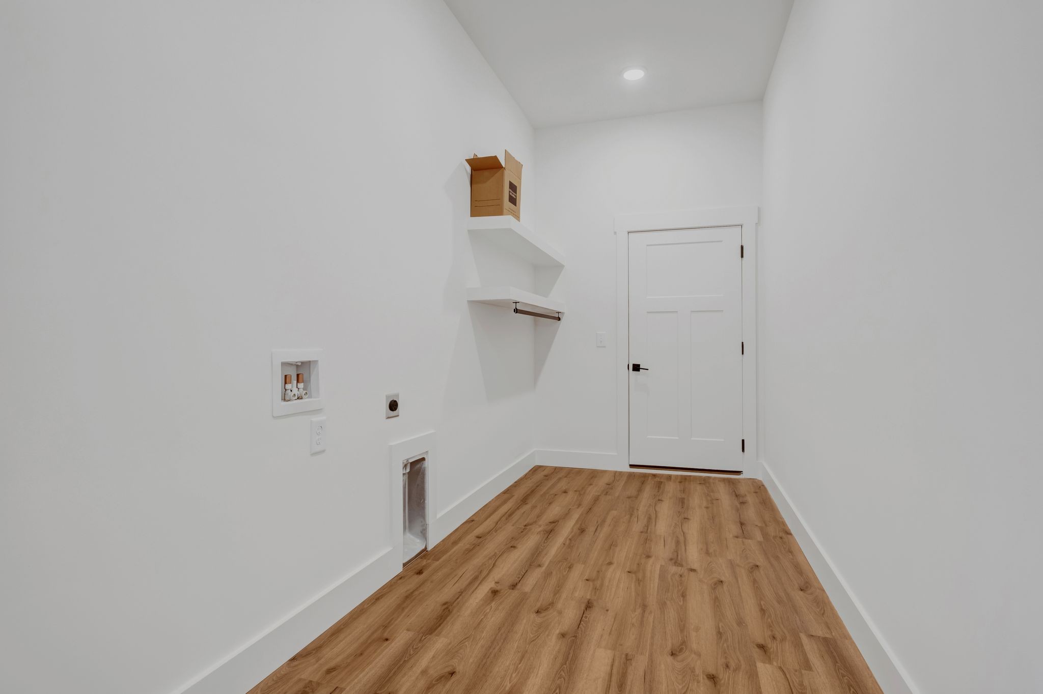 5050 Richards Road Adams, TN 37010 - Photo 31 of 52 a view of a room with wooden floor and a window