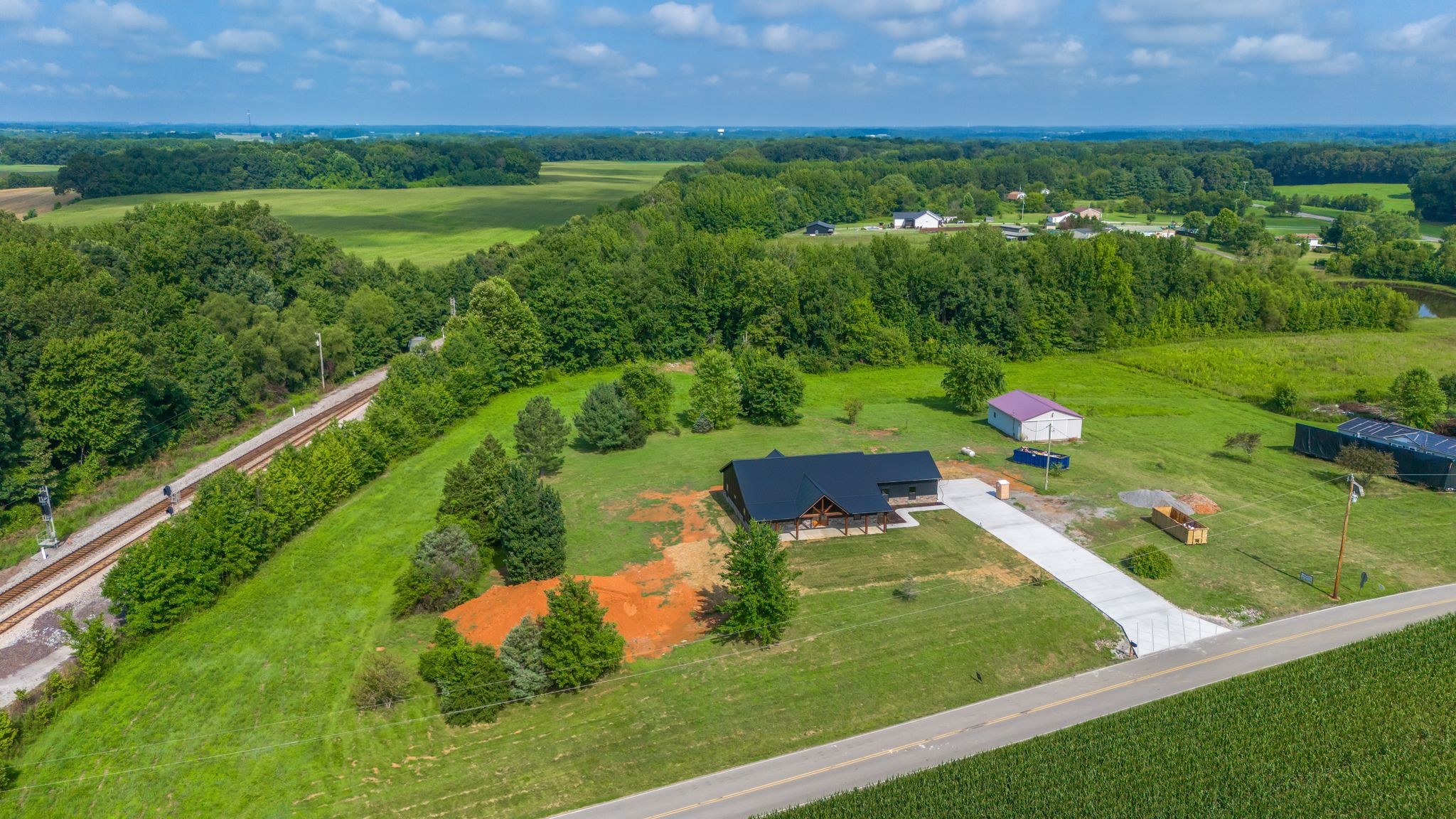 5050 Richards Road Adams, TN 37010 - Photo 39 of 52 a view of a lush green field