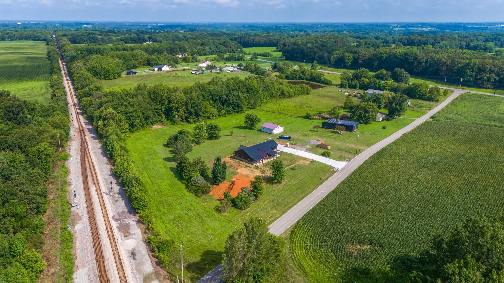 5050 Richards Road Adams, TN 37010 - Photo 40 of 52 a view of a lake with a city