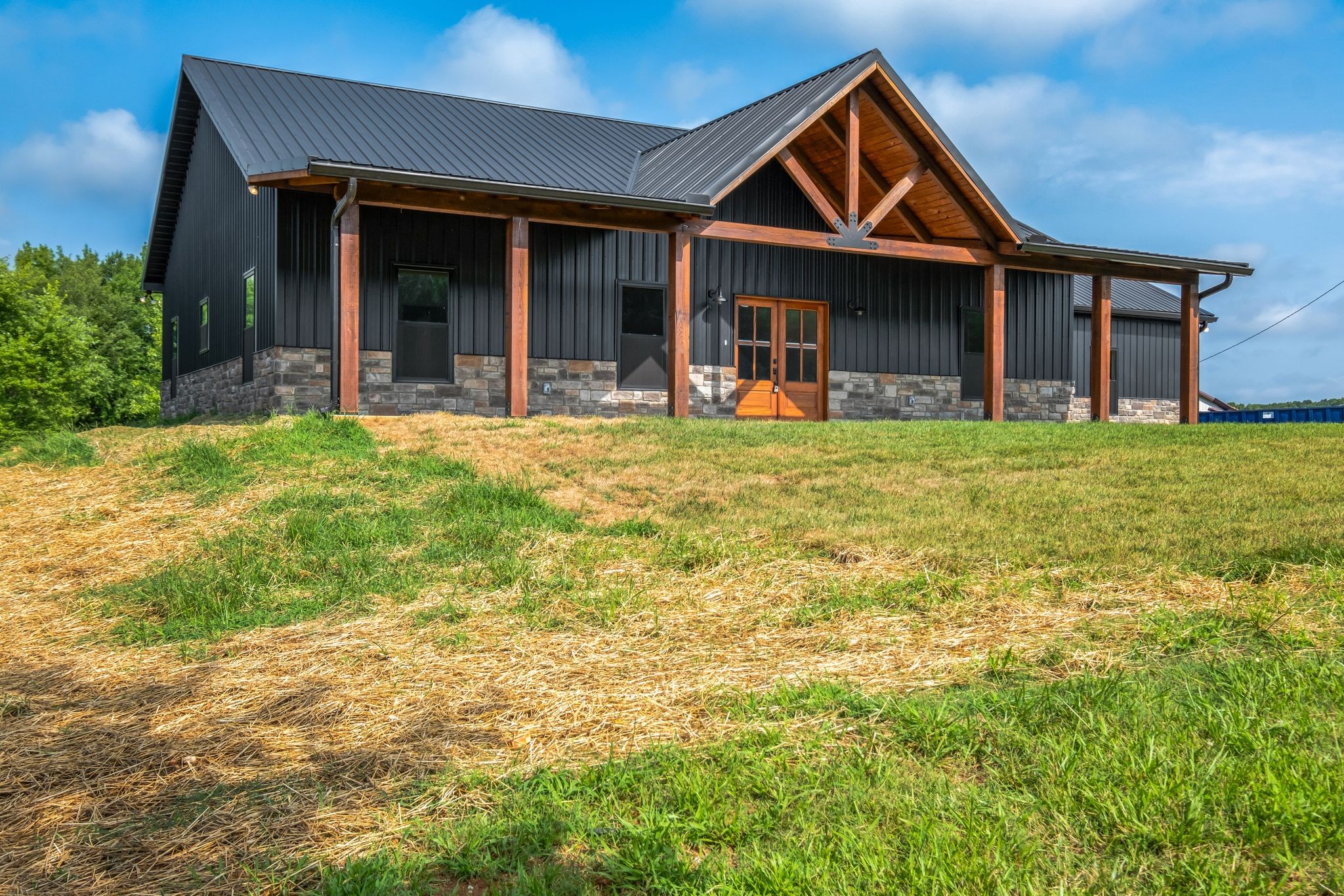 5050 Richards Road Adams, TN 37010 - Photo 4 of 52 front view of a house with a yard