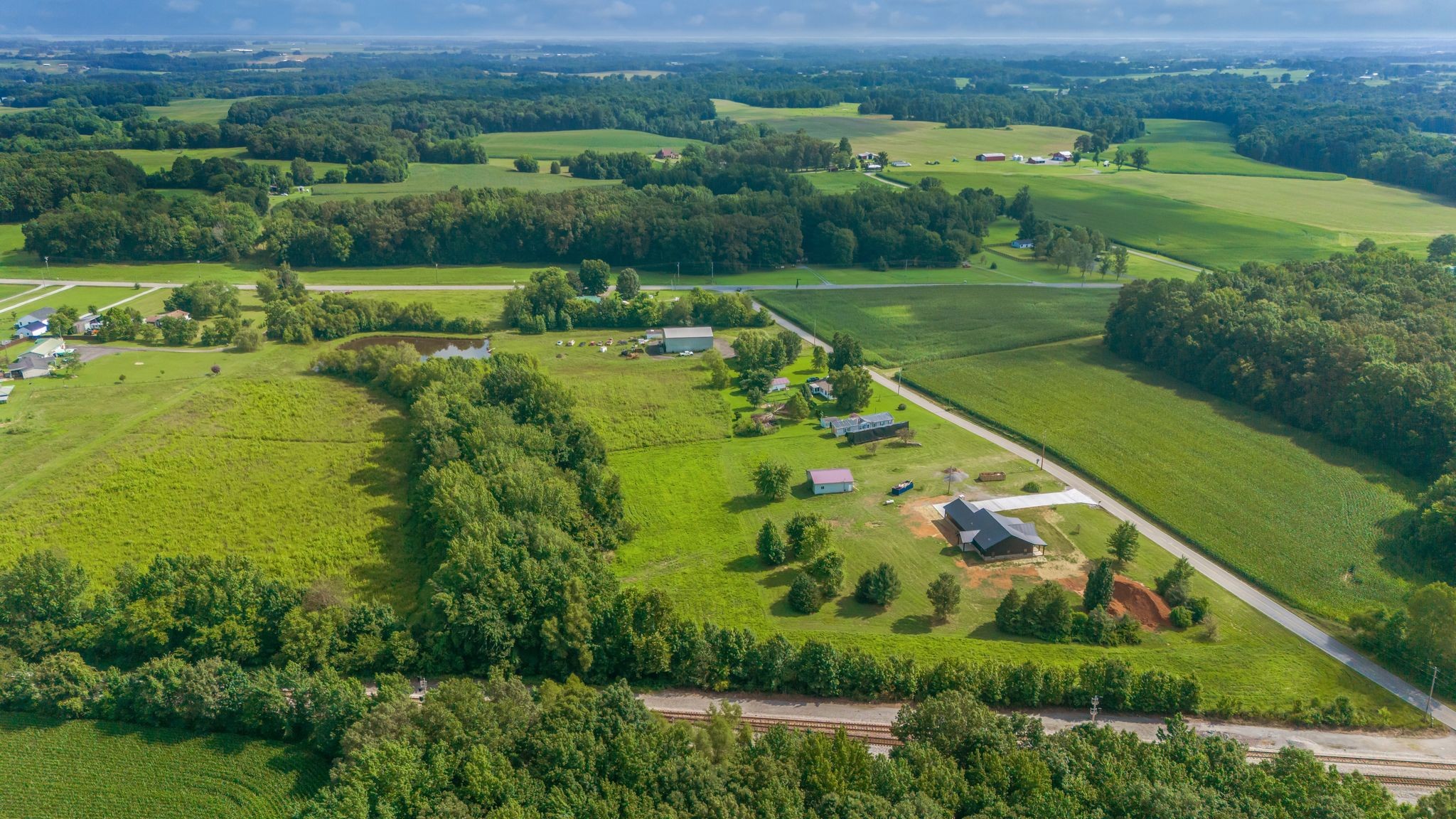 5050 Richards Road Adams, TN 37010 - Photo 46 of 52 an aerial view of huge green field with lots of green plants