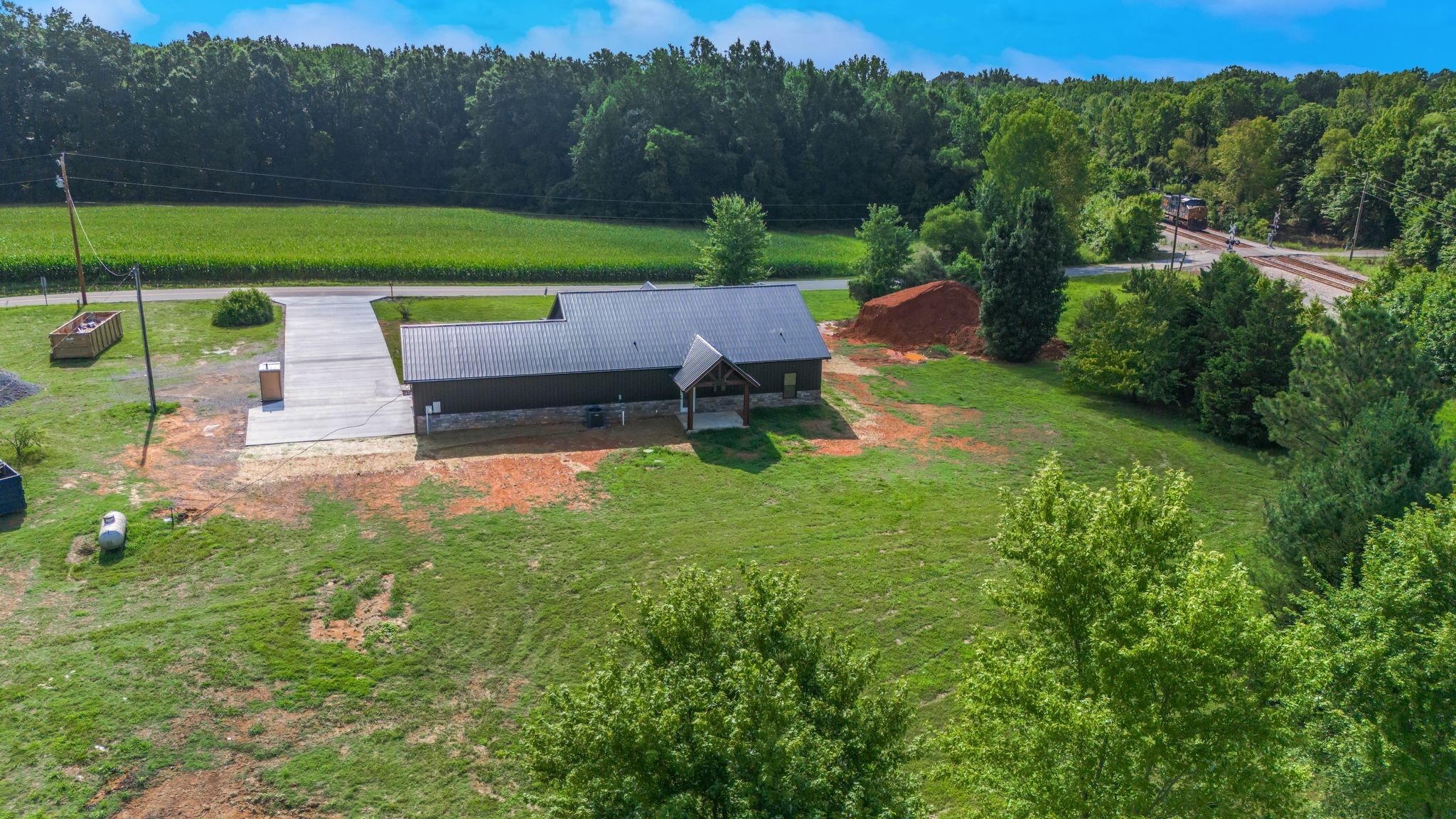 5050 Richards Road Adams, TN 37010 - Photo 47 of 52 a view of backyard with seating area and green space
