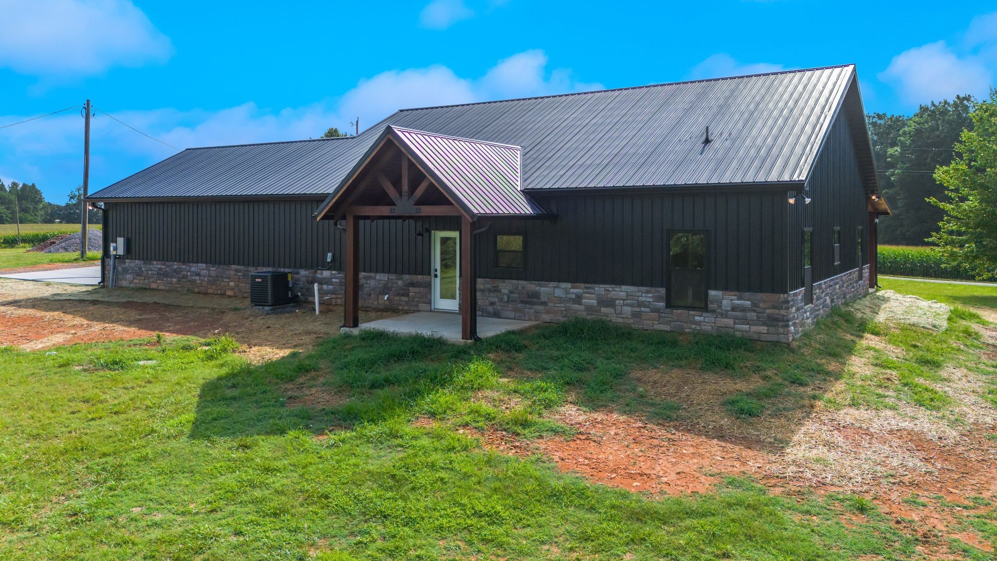 5050 Richards Road Adams, TN 37010 - Photo 49 of 52 a front view of a house with a yard