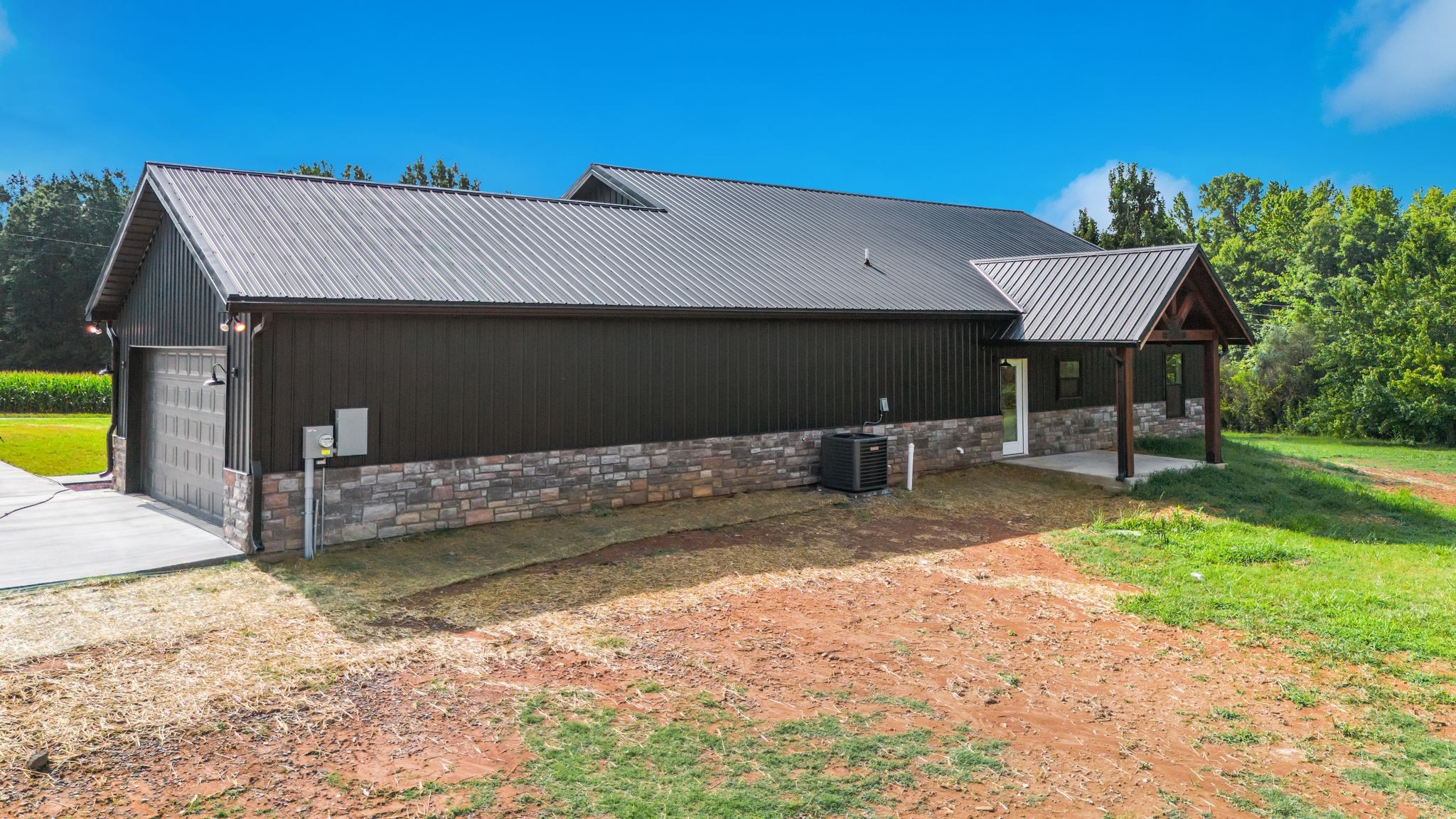 5050 Richards Road Adams, TN 37010 - Photo 51 of 52 a front view of a house with a yard