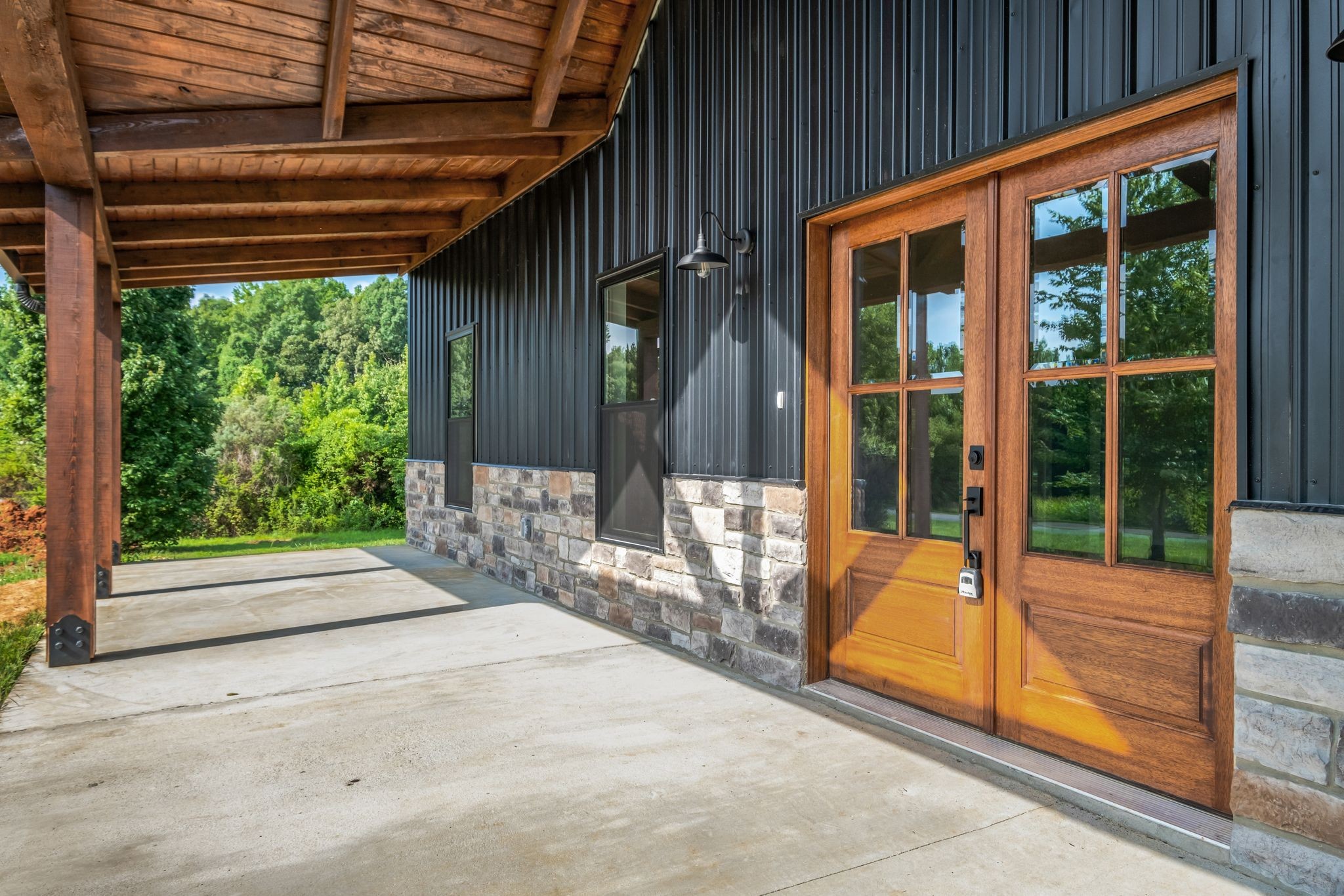 5050 Richards Road Adams, TN 37010 - Photo 6 of 52 a view of backyard with porch