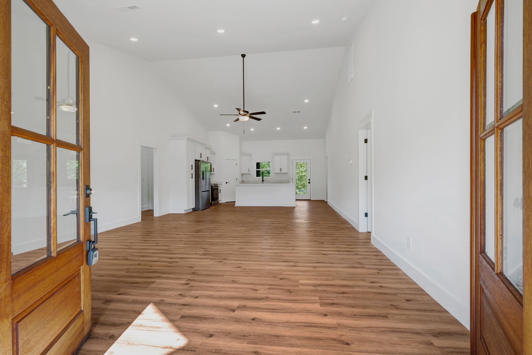 5050 Richards Road Adams, TN 37010 - Photo 8 of 52 a large room with wooden floor